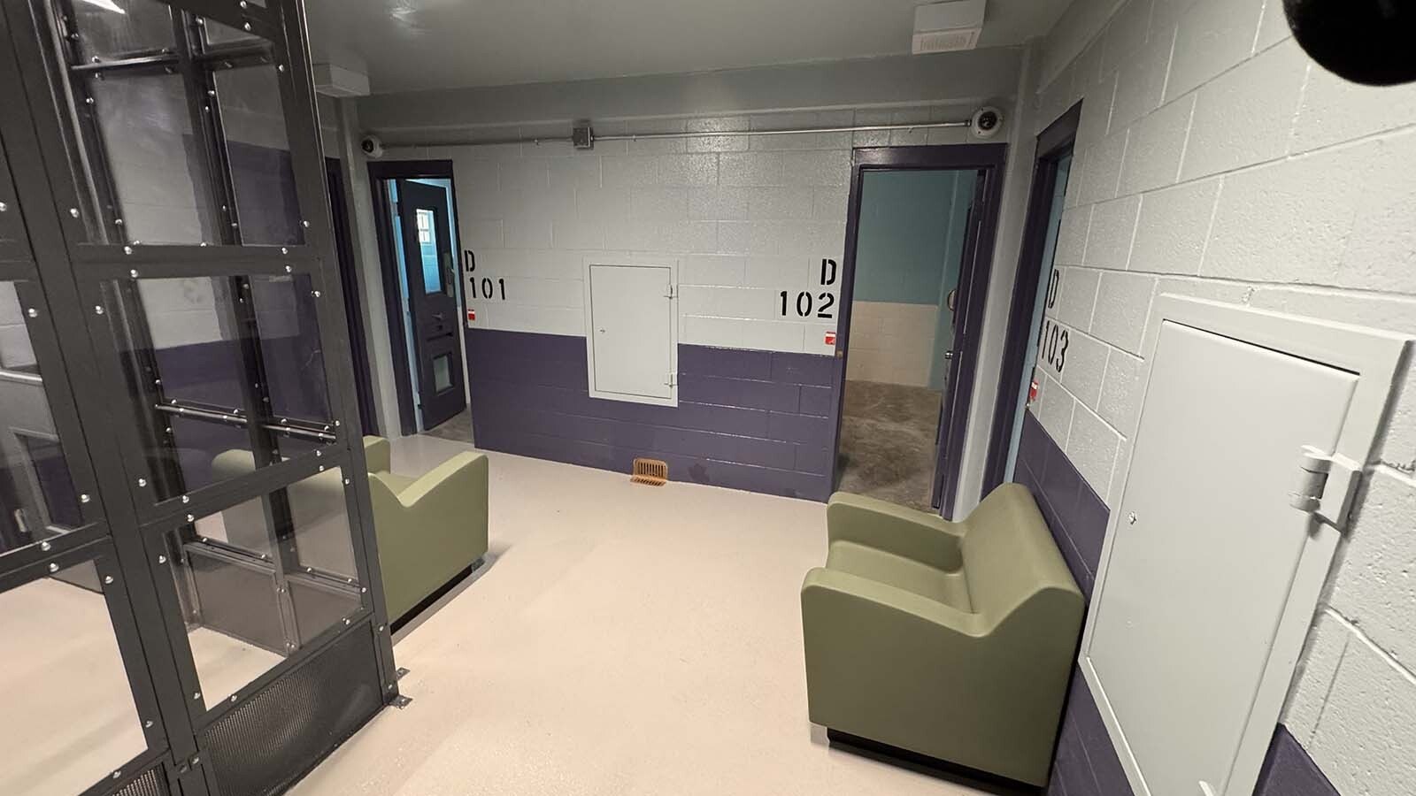Laramie County Sheriff Brian Kozak talks about the new mental health pods at the Laramie County Detention Center, describing how a significant number of inmates have serious mental problems but the jail didn't have an adequate place to hold them. There are layers of security. Outside the cells is a lounge-type area where inmates can sit without being with others, and the furniture is safe for them.