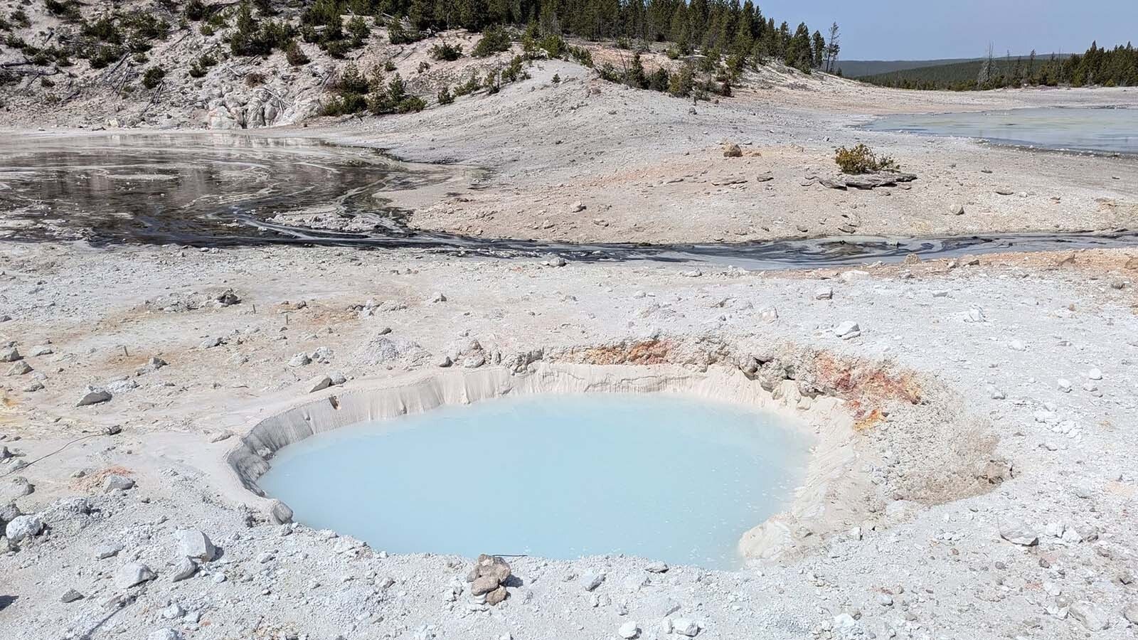 Yellowstone National Park announced Monday the discovery of a new 13-foot, baby blue hot spring. It emerged with little volcanic fanfare in the Norris Geyser Basin and has scientists excited.