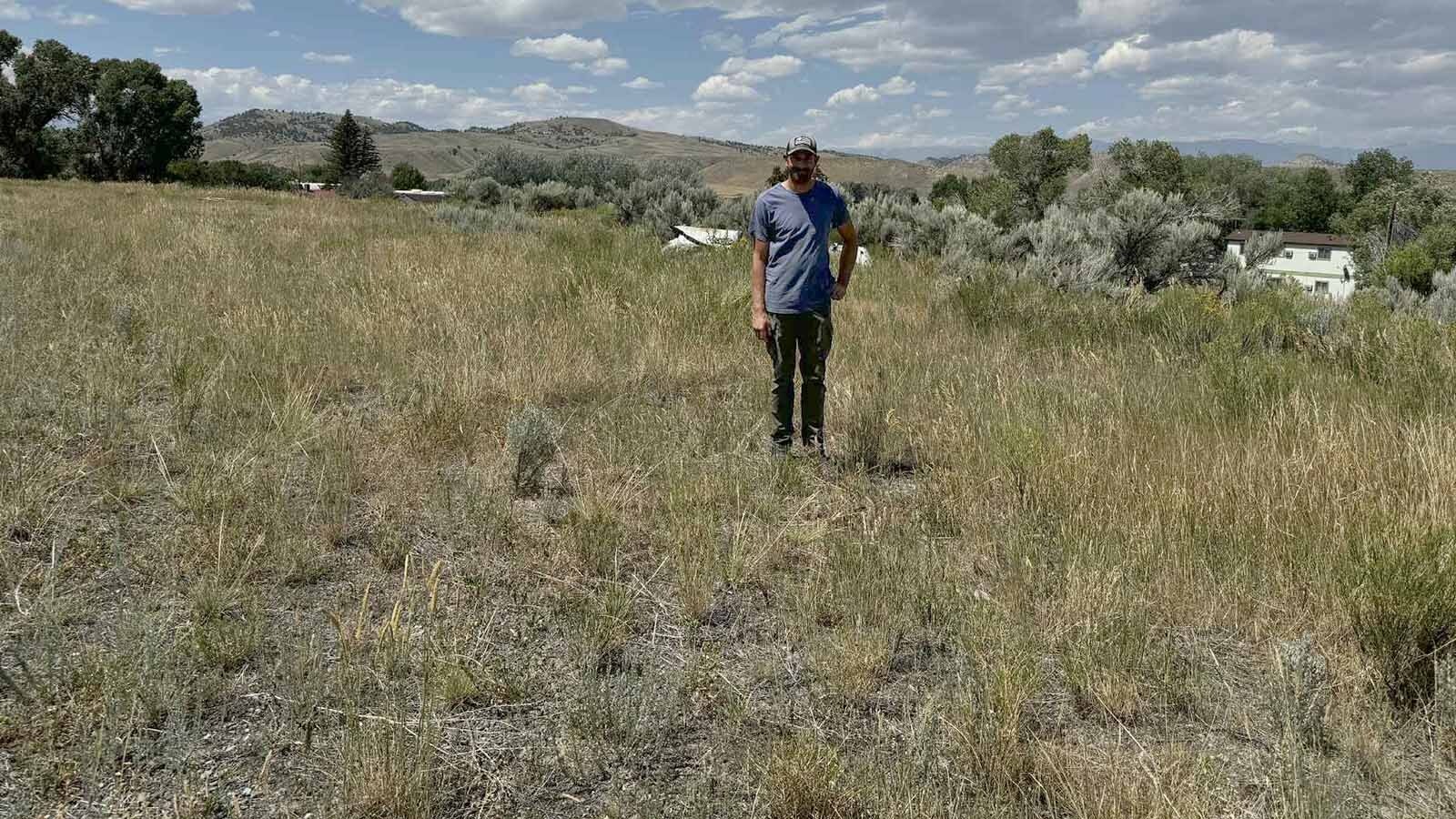 Justin Gerlach stands at the future site of "the permanent foundry" he wants to build in Meeteetse. While an operational bronze foundry is expected to be up and running in 2026, Gerlach hopes to open a much larger facility at this location within three years, bringing more artists and jobs to northwest Wyoming.
