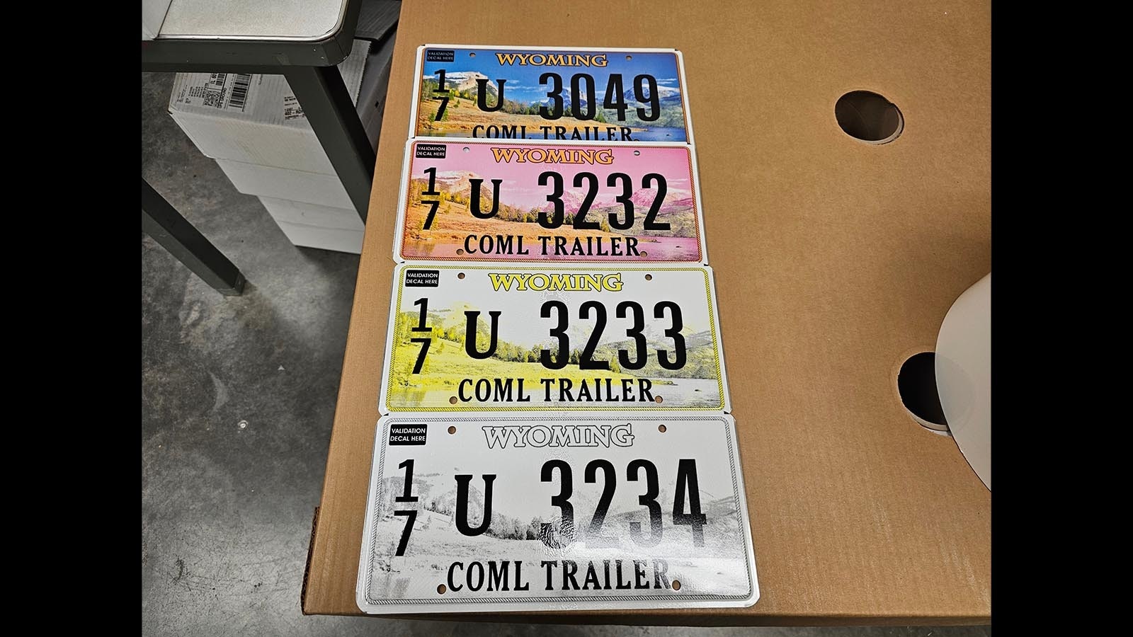Wyoming license plates are actually a composite of four colors which, when overlaid on each other, makes the final color and design.