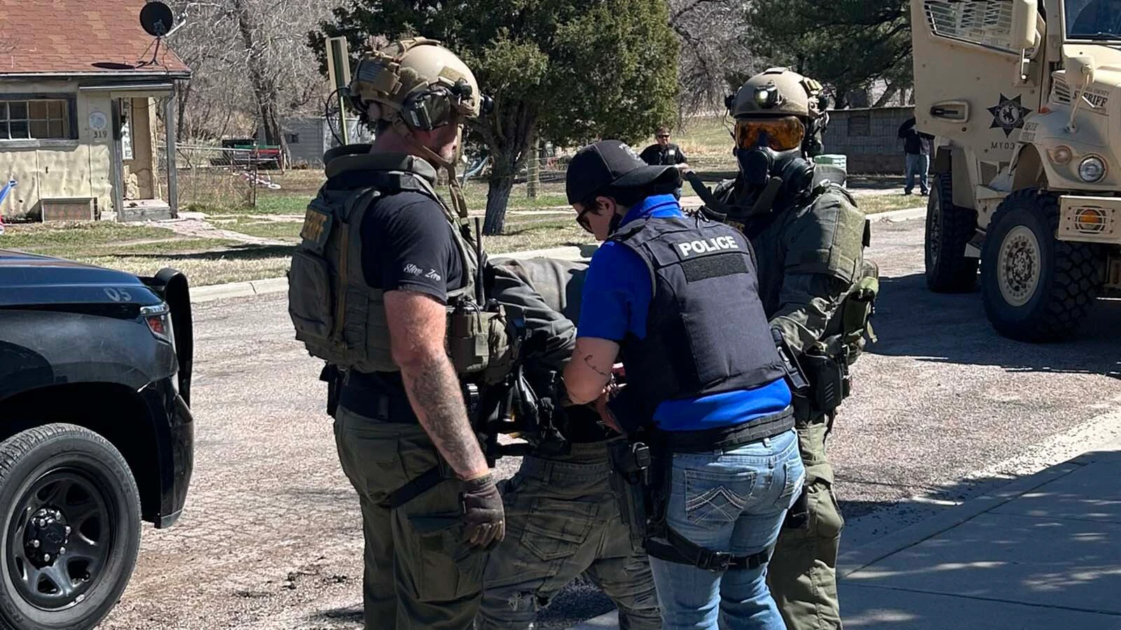 Brandon Suess is taken into custody after a four-hour standoff with police in Newcastle, Wyoming, on Monday, March 23, 2026.