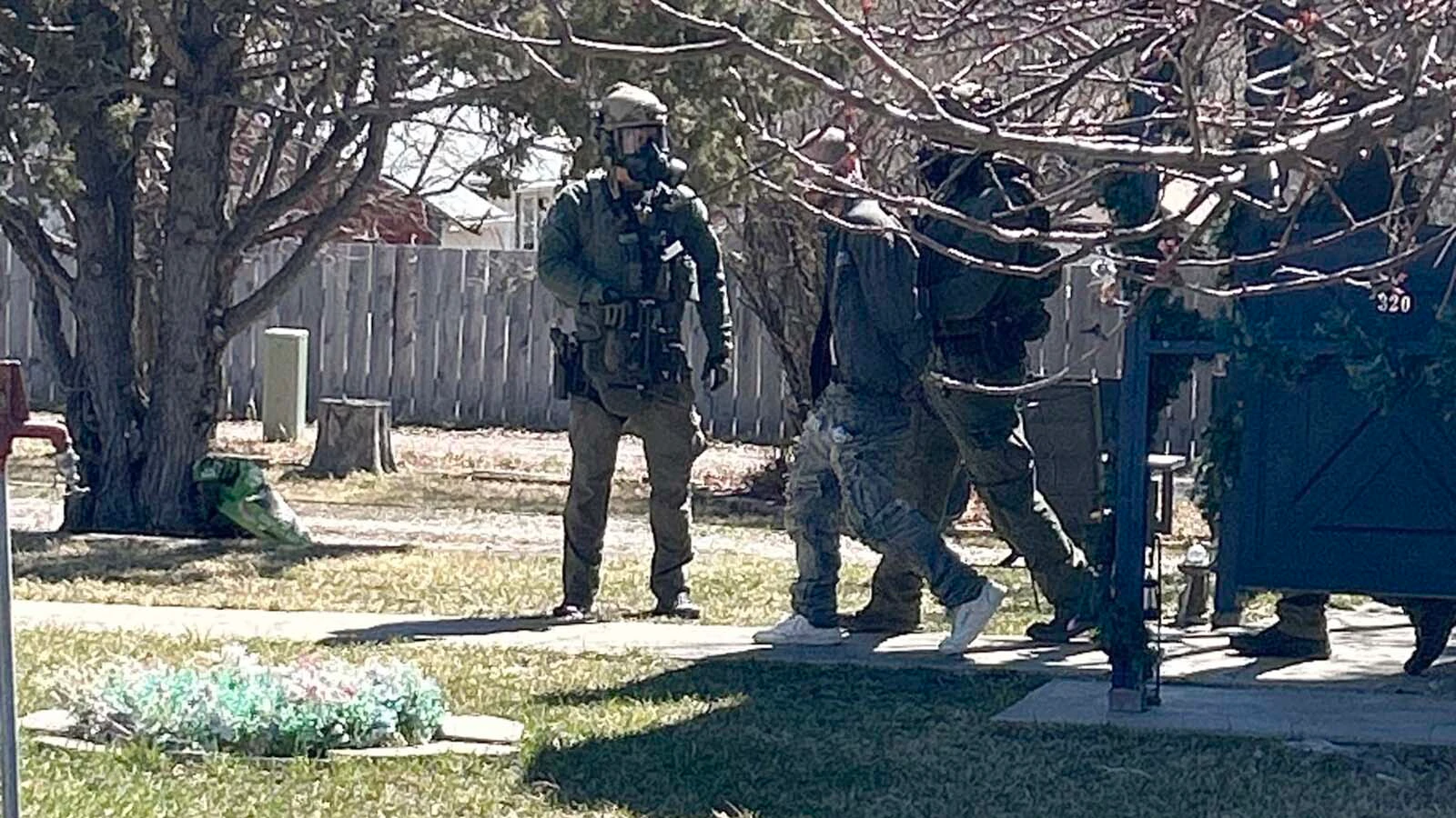 Brandon Suess is taken into custody after a four-hour standoff with police in Newcastle, Wyoming, on Monday, March 23, 2026.
