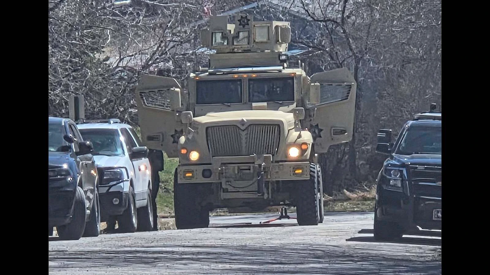 Members of the Cambpell County Sheriff's Office SWAT team respond to a standoff at a home in Newcastle on Monday, March 23, 2026.