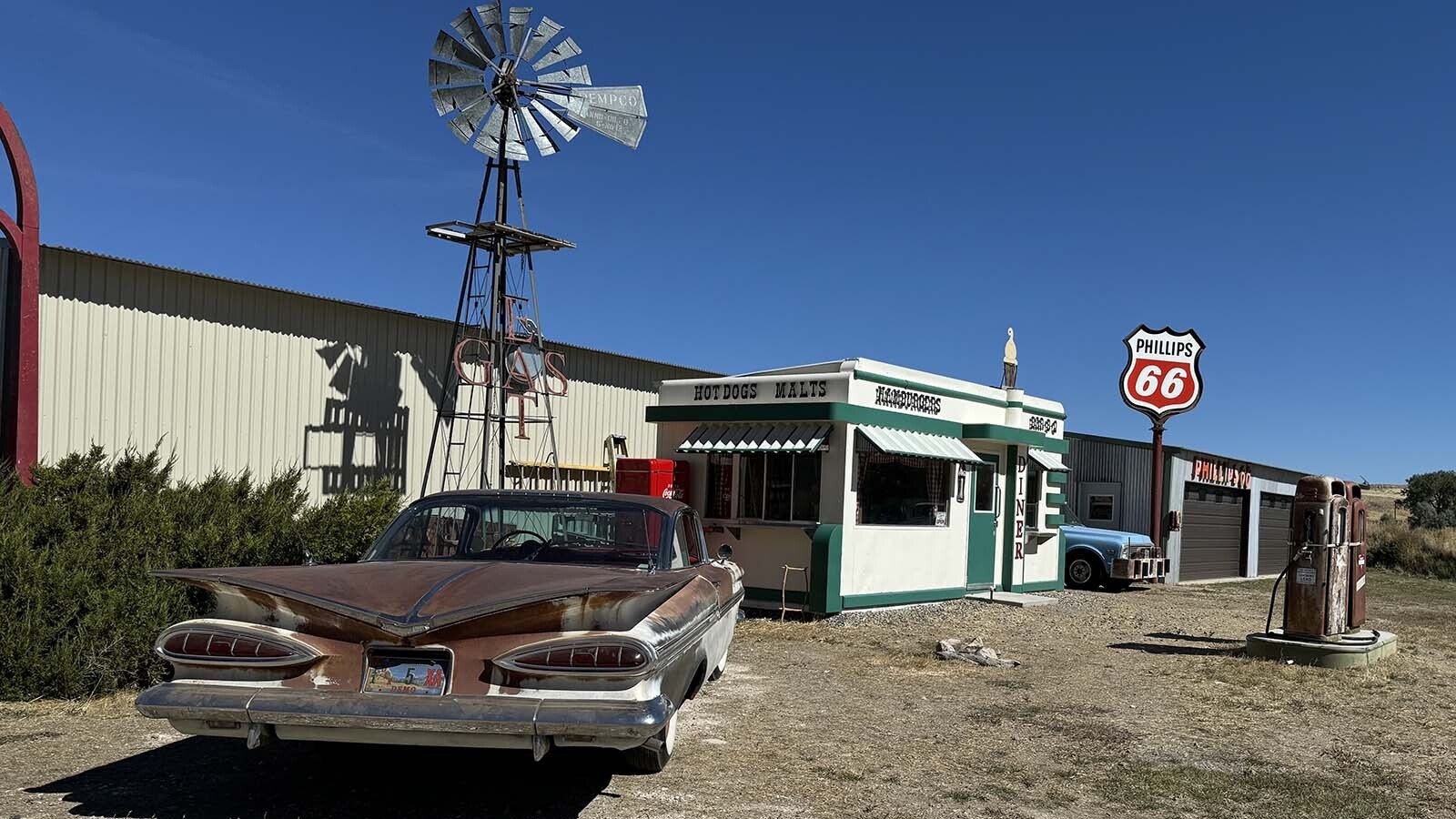 A 1959 Chevy Impala (with original paint) parked in front of a "Nifty Niner" Valentine diner on a private ranch near Cody. The diner was built by the Valentine Manufacturing Company and transported from Wichita, Kansas to Cody, Wyoming, in 1948.