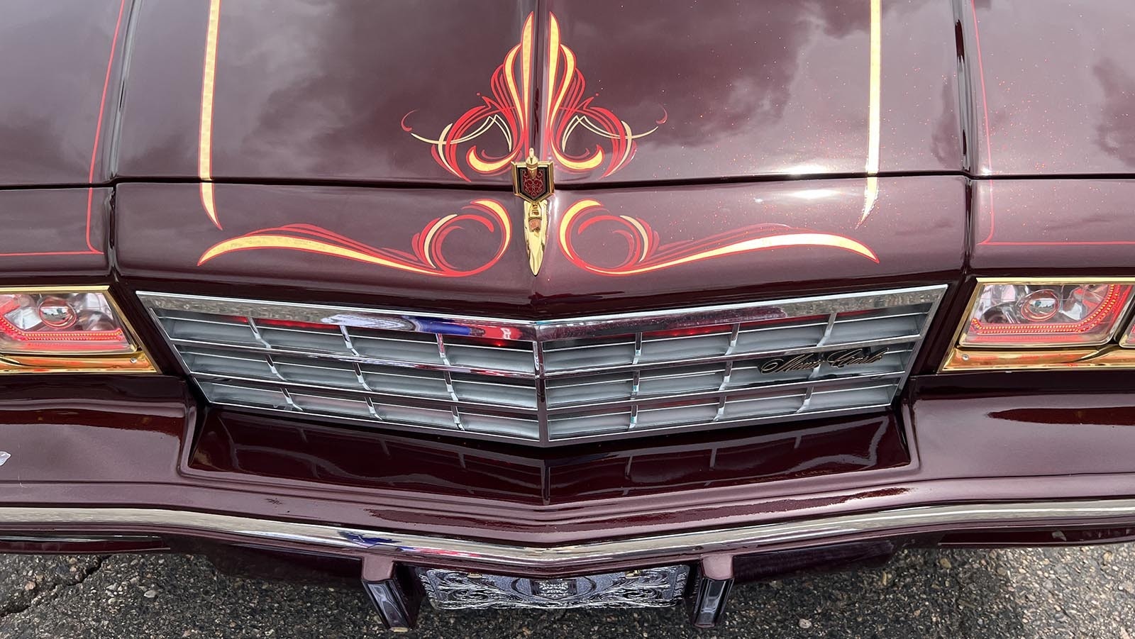 The pinstriping on the hood of the Nightmare Monte, along with its "halo" headlights.