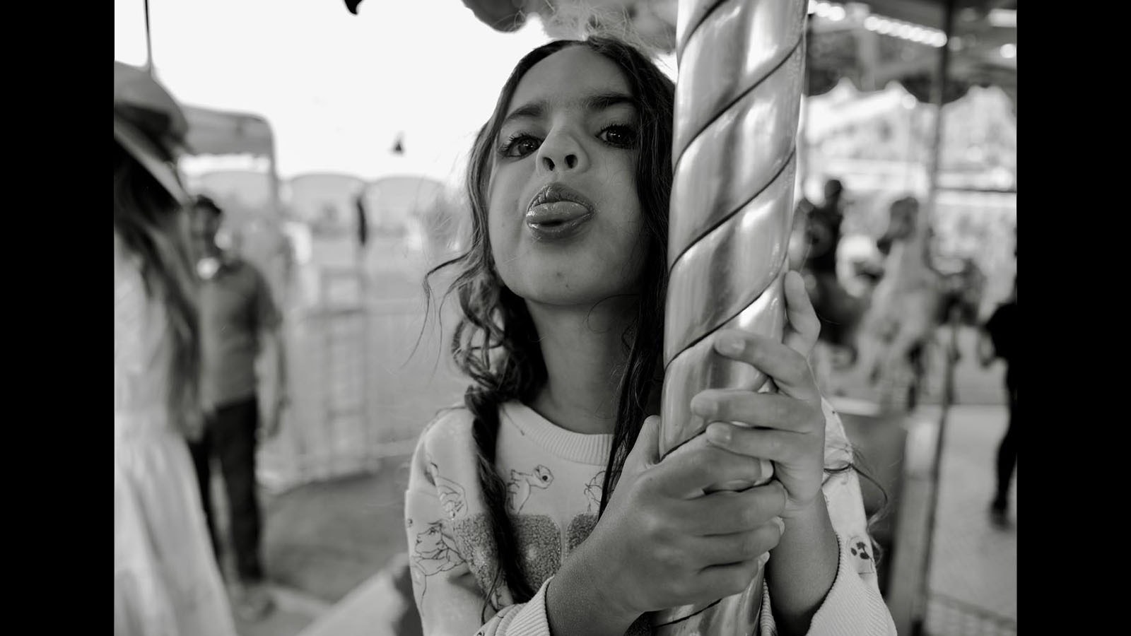 Nikki Sixx's daughter Ruby, 4, enjoys the carousel at the Teton Count Fair.