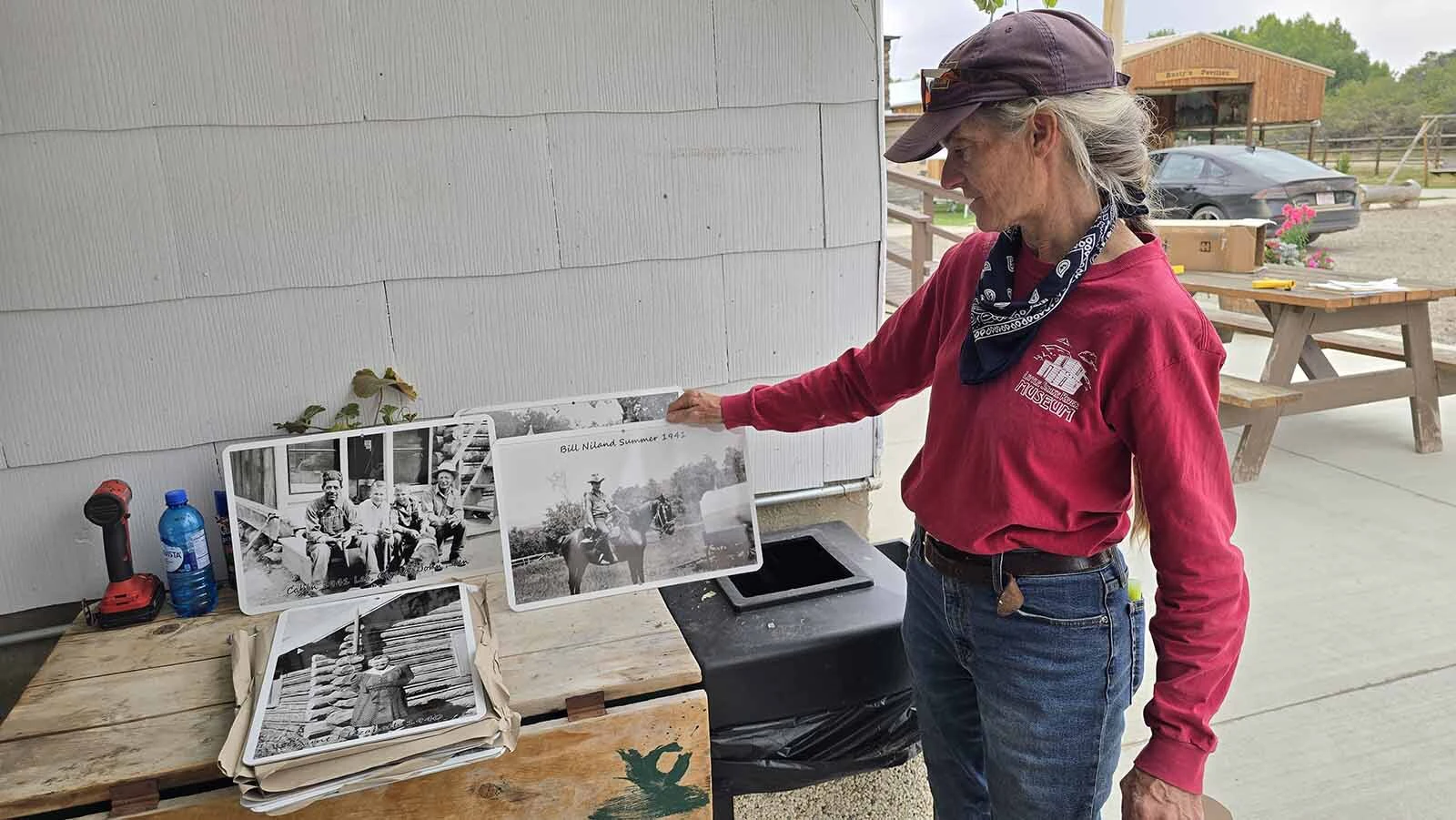 A metal plate with ap photograph of Bill Niland is among photographs Little Snake River Museum Director Lela Emmons will place at the Niland Cabin in the Medcine Bow-Routt National Forest.