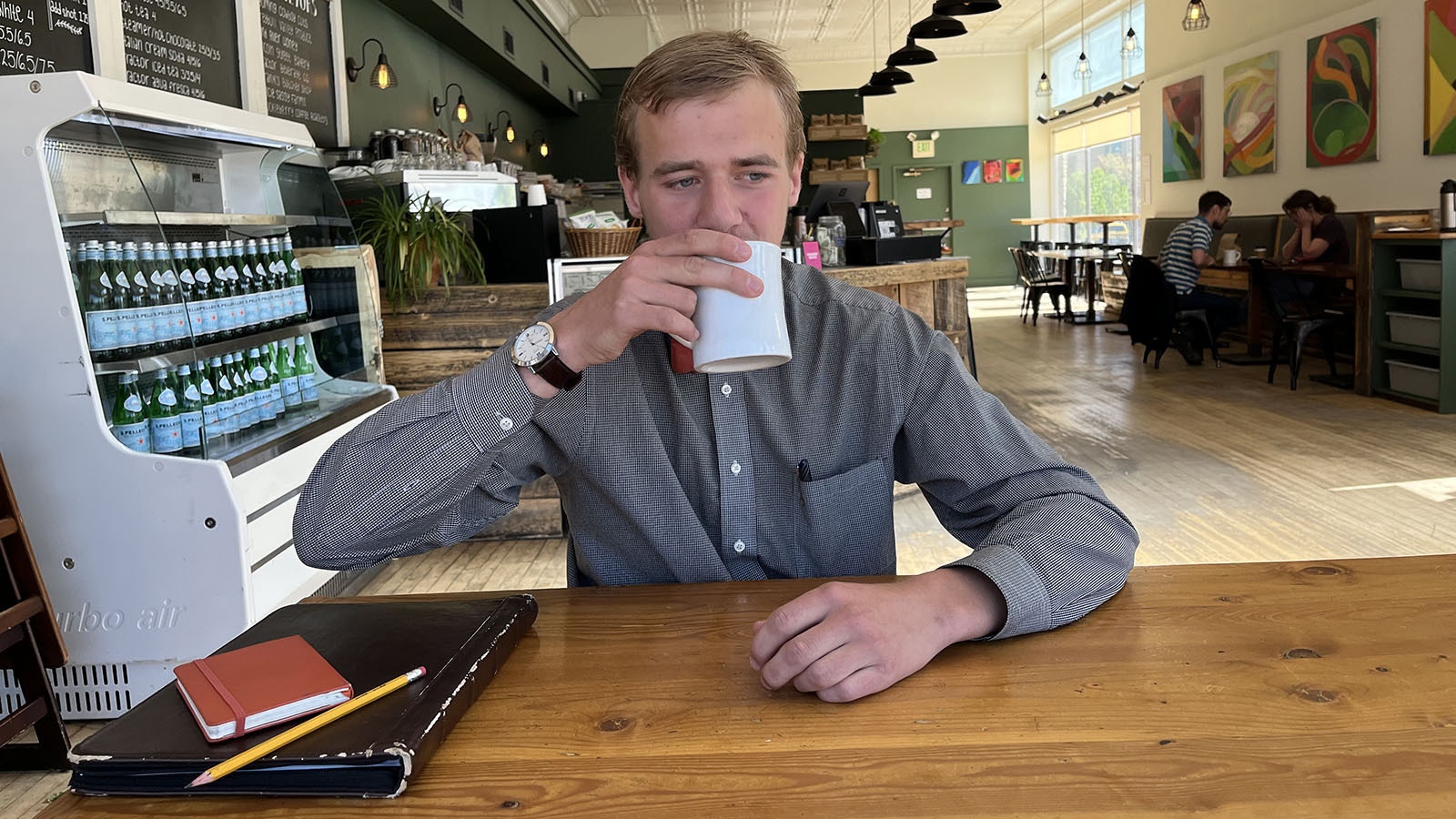Kolya Sidloski, a Wyoming Catholic College student, in a contemplative mood at Sinks Coffee in Lander. Like all other WCC students, Sidloski gives up his cellphone for four years while attending.