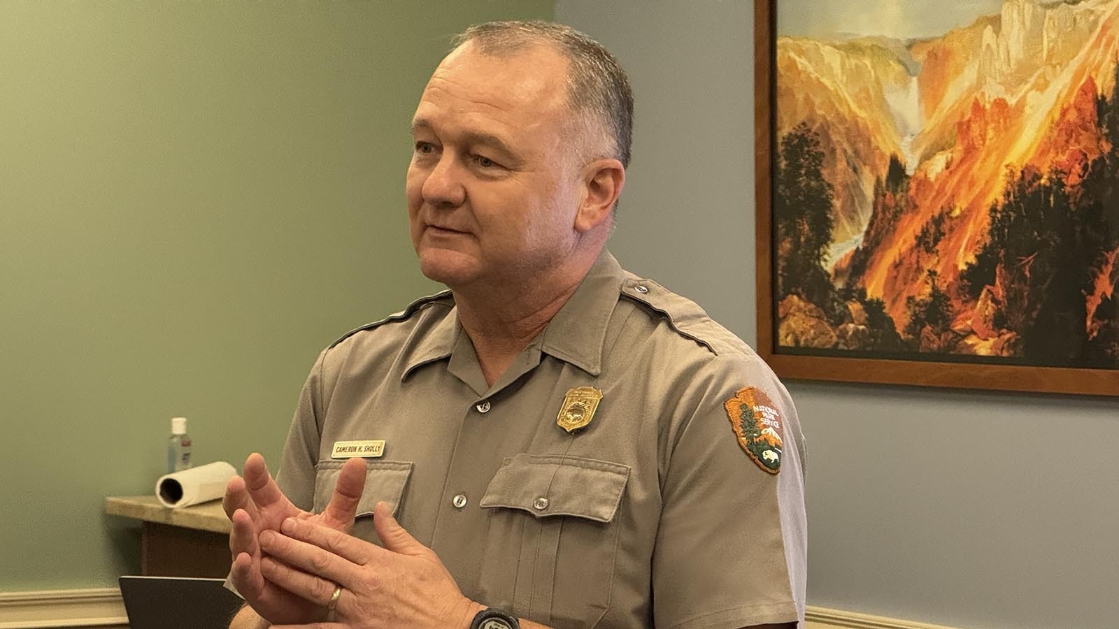 Yellowstone superintendent Cam Sholly addresses the crowd gathered for the public meeting on the new North Entrance Road into Yellowstone National Park. Sholly encouraged their comments and criticisms, saying the decisions made today will "extend beyond any of our lifetimes."