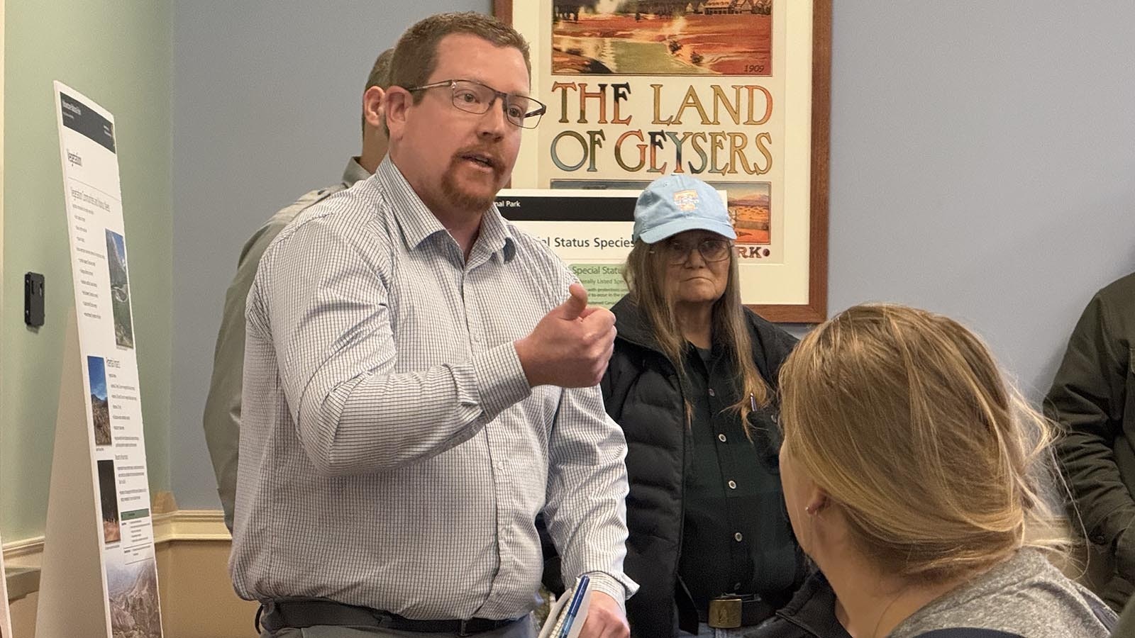 Nathan Jones with the Federal Highway Administration answers questions during a public meeting about Yellowstone's new North Entrance Road.