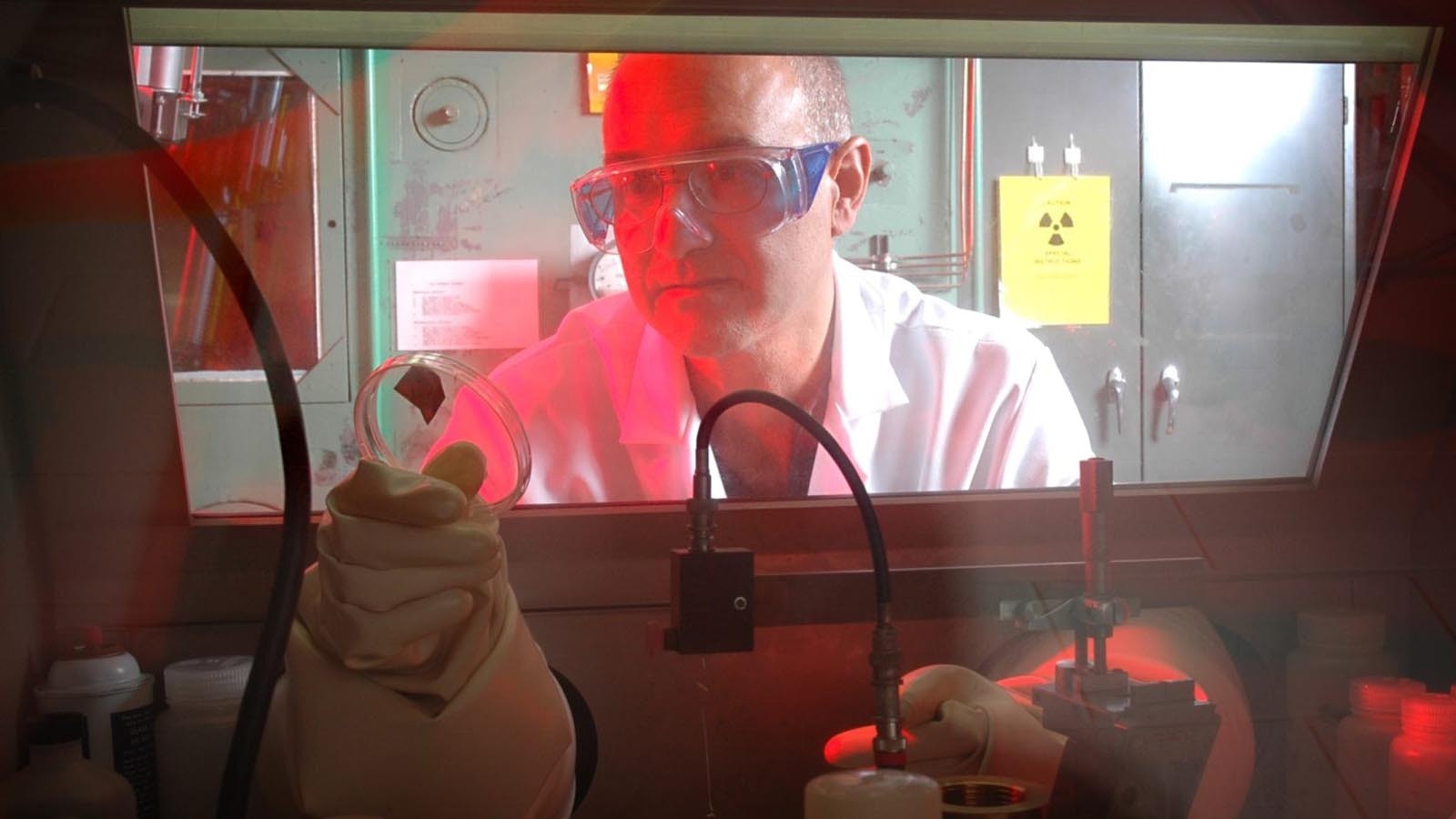 At the Idaho National Lab, researchers say they are striving to perfect the reprocessing and recycling of nuclear fuel rods, while watchdogs raise concerns about radioactive emissions released during this work.