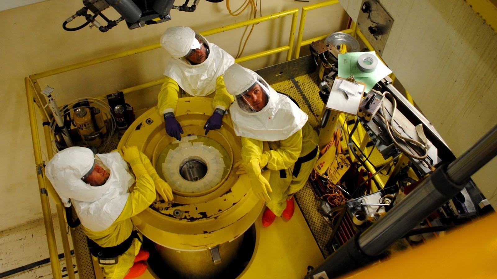 At the Idaho National Lab, researchers say they are striving to perfect the reprocessing and recycling of nuclear fuel rods, while watchdogs raise concerns about radioactive emissions released during this work.