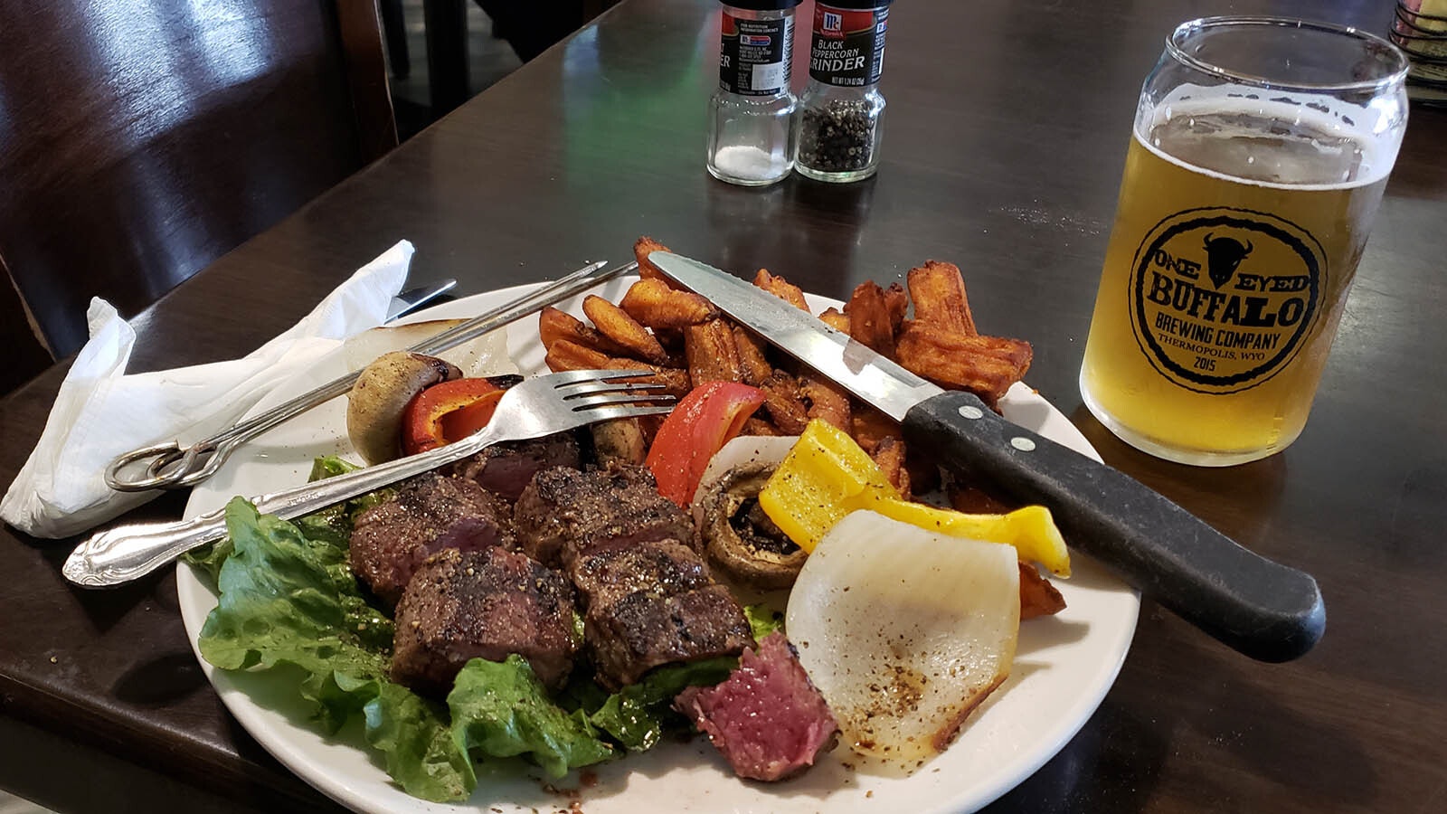 Doesn't get better than the steak kabobs with a craft brew.