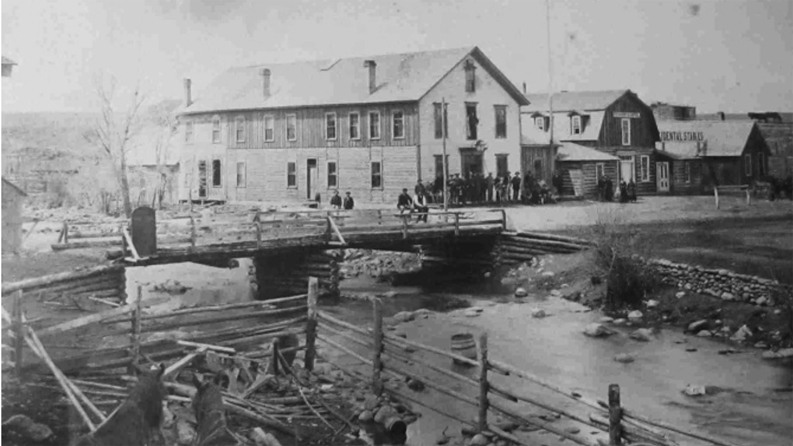 Buffalo, Wyoming, 1883. Early bridge over Clear Creek and Occidental Hotel.