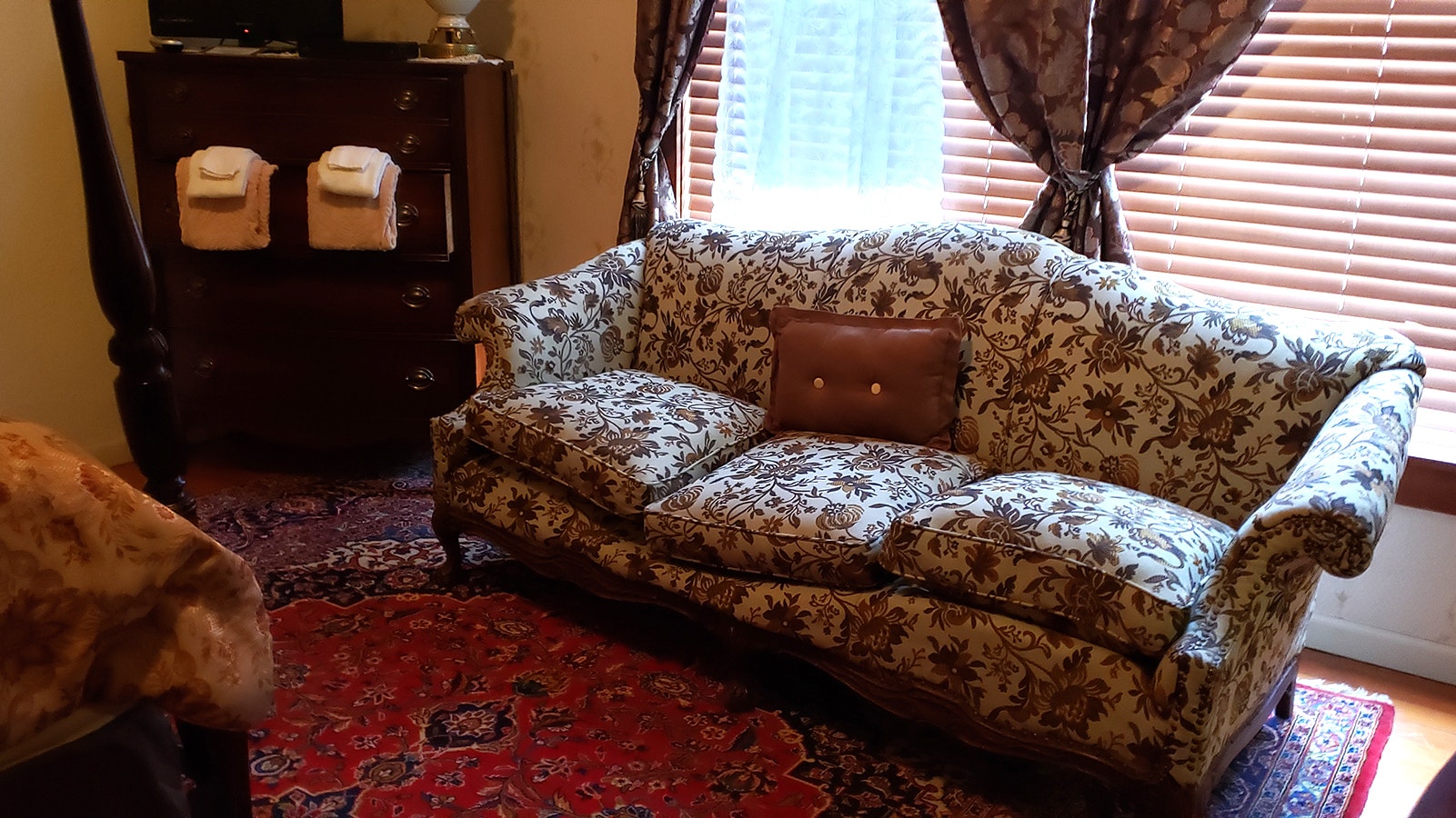 A sofa in the Cloud Peak Suite's second bedroom.