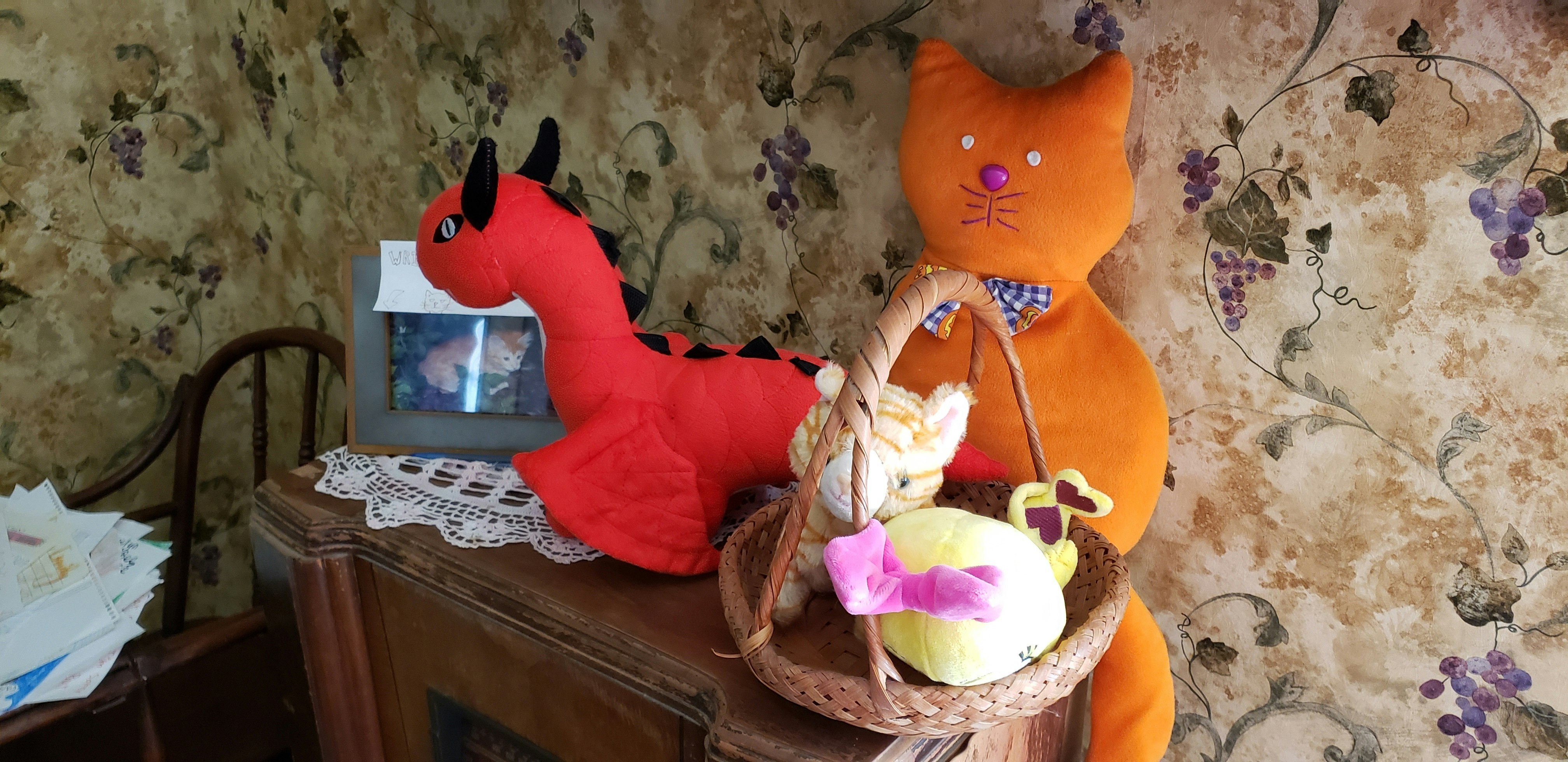A stuffed orange cat and other animals left for the ghost of Emily in a room near the one where the girl died of cholera in the early 1900s.