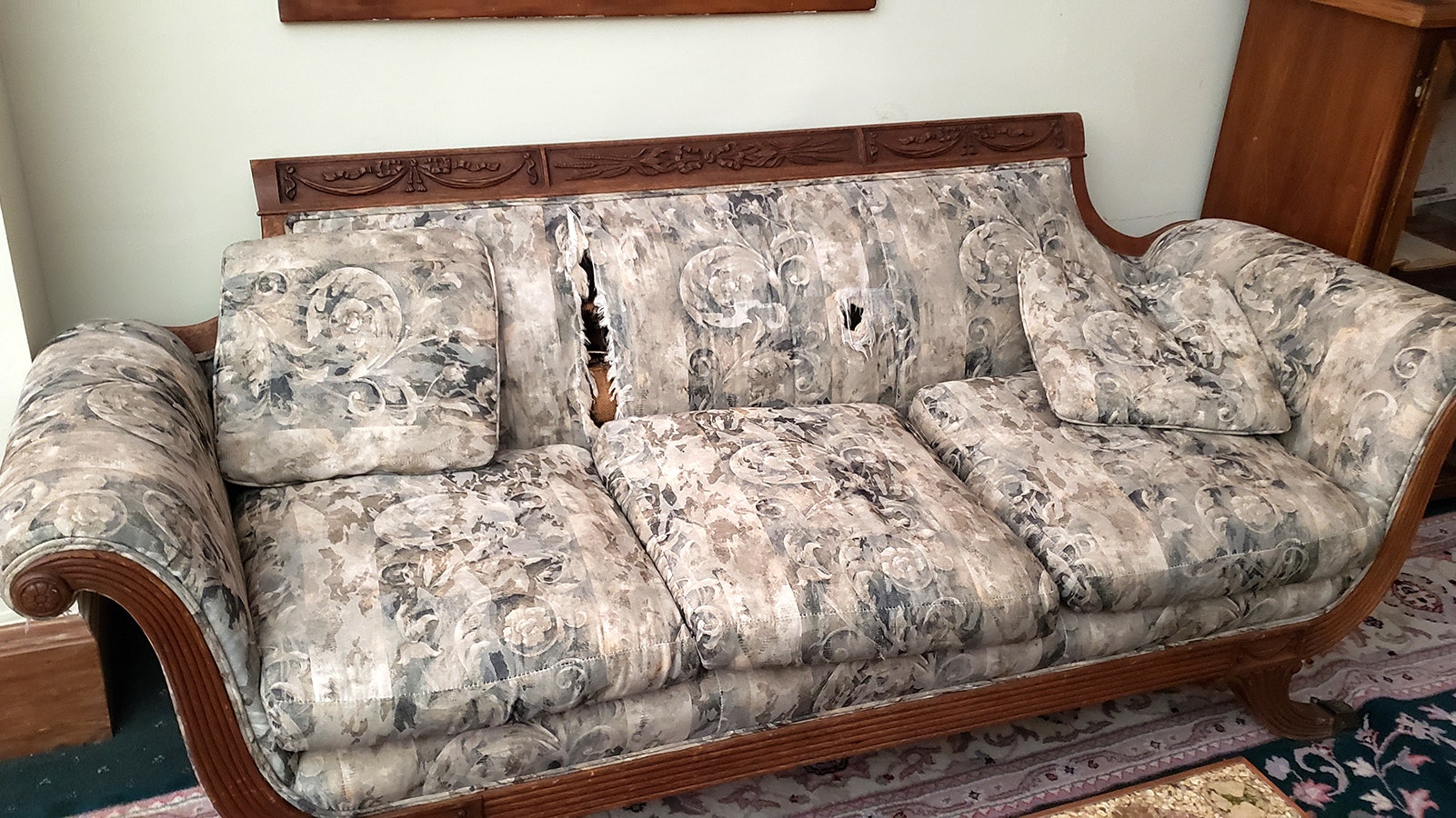 The Herbert Hoover couch looks like it should be sitting on a curb as trash instead of having an honored place in the historic Occidental Hotel. It was once owned by President Herbert Hoover, and popular lore has it the rips and tears in it were caused by fishhooks Hoover would keep in his pockets.