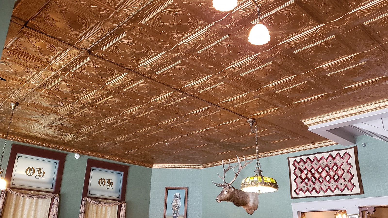 The original hand-struck tin ceilings were hiding behind a fake ceiling.