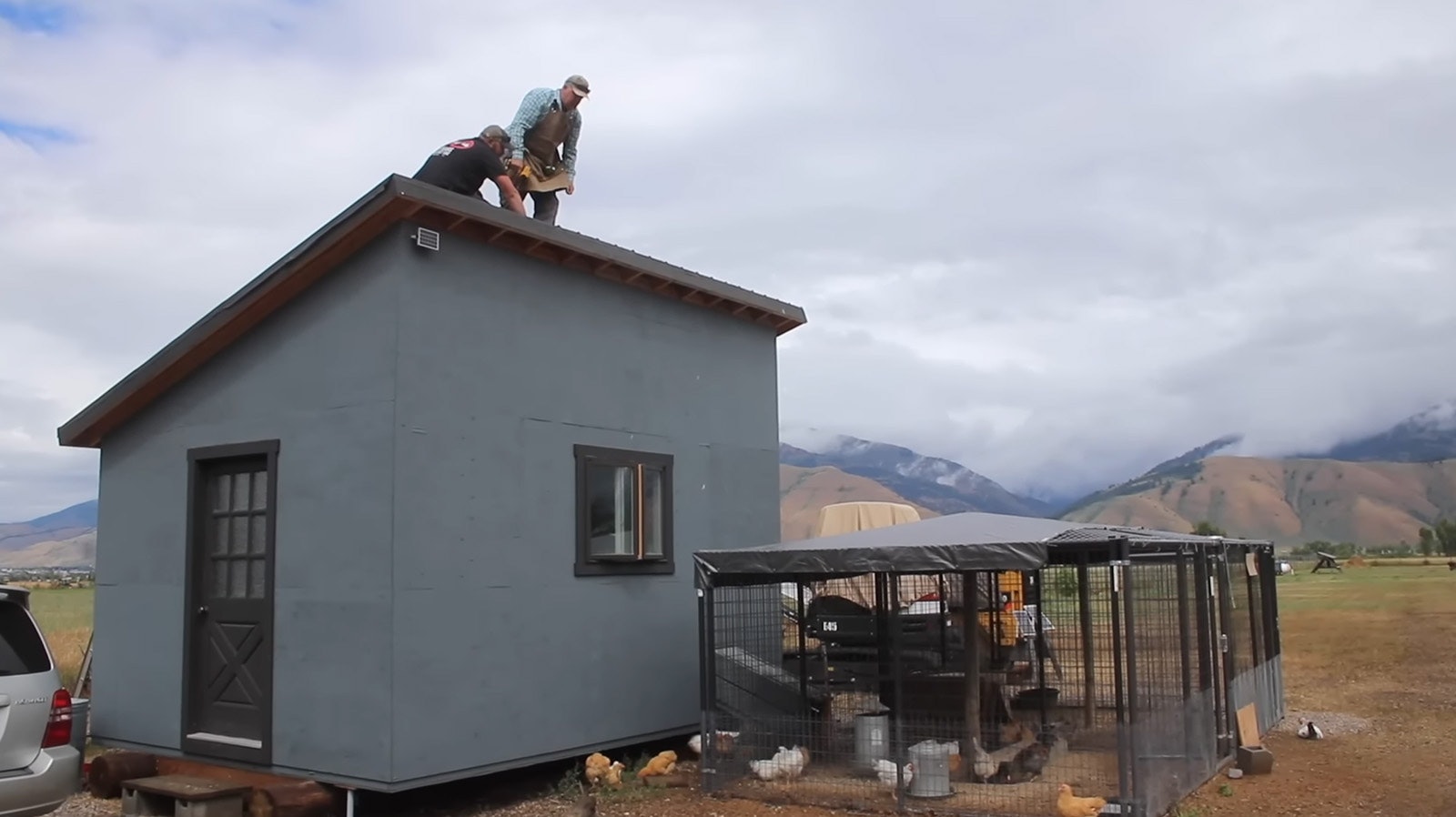 An off-grid homestead, like this one in the norther Wyoming mountains, can include multiple buildings, sheds, a chicken coop and gardens.