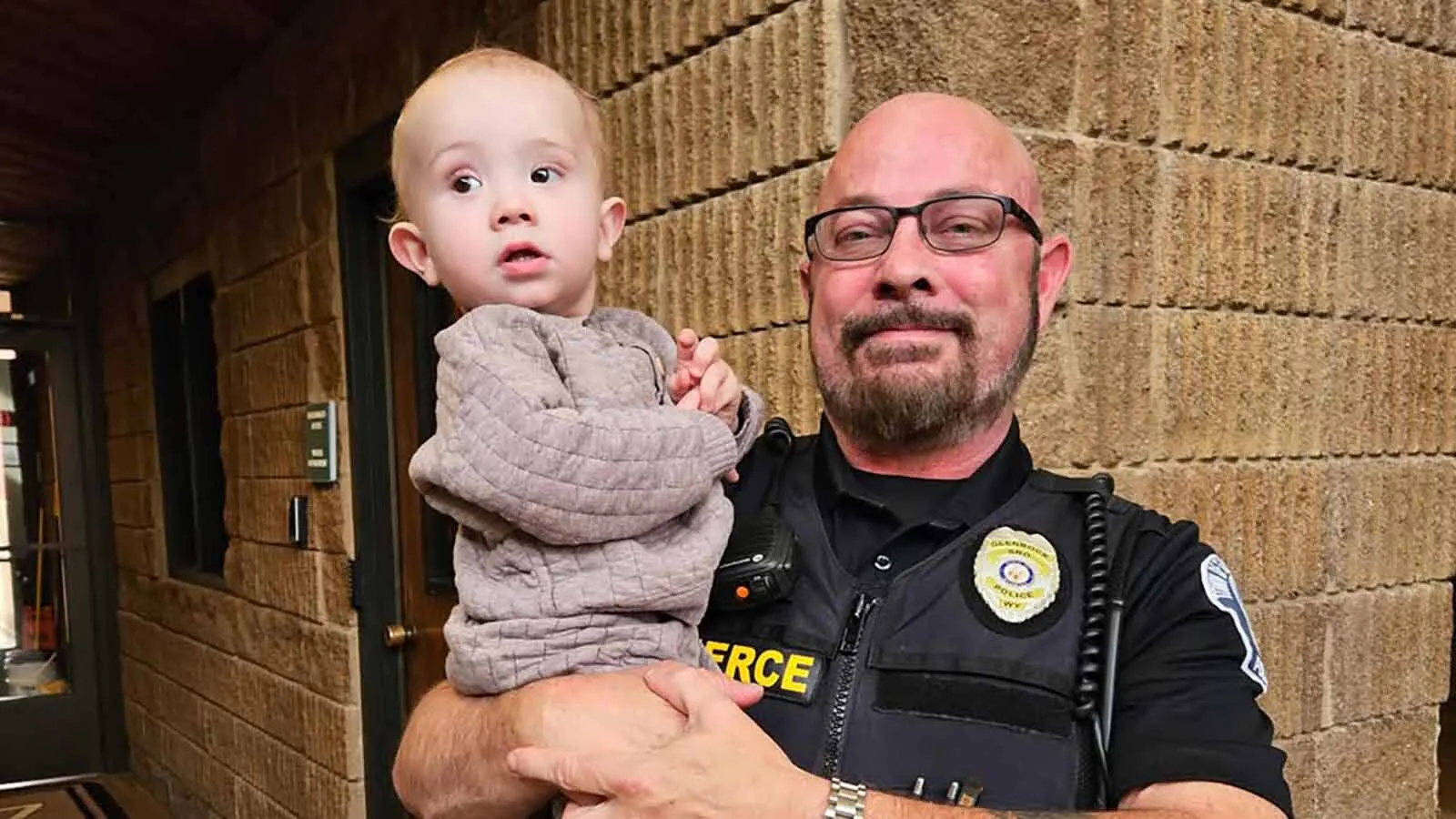 Glenrock Police Officer Shane Pierce and Colton Trullinger, whose life the officer helped save.