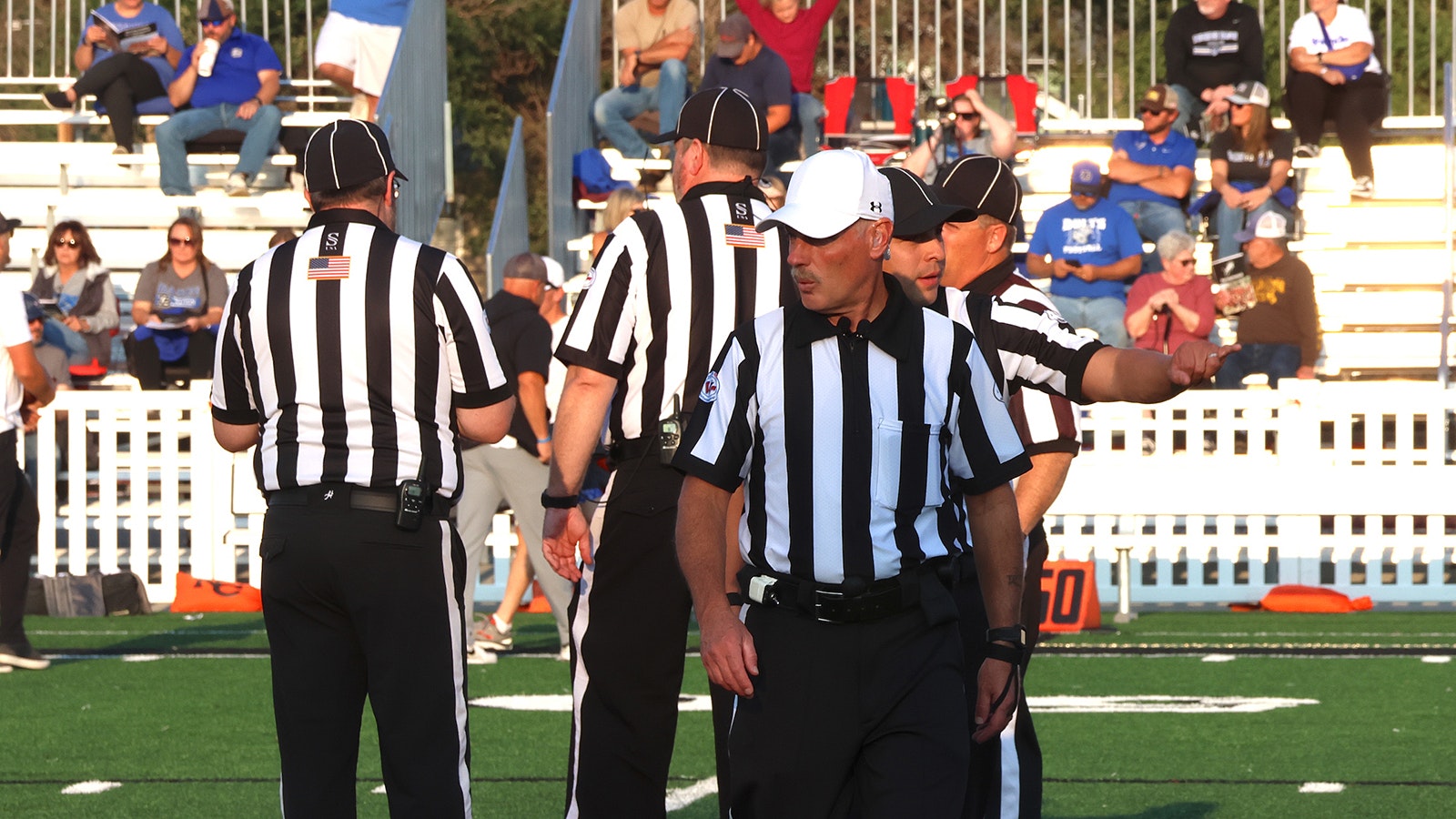 The crew gets ready for the beginning of a game between Natrona County and Thunder Basin high schools in Casper.