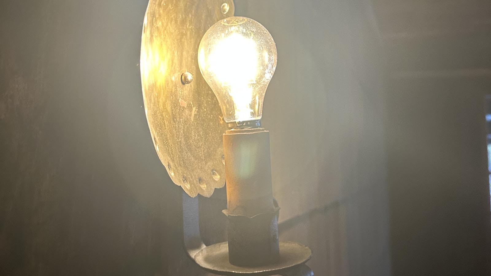 A ghostly light fixture that helps to set the ambience for the historical section of Old Faithful Inn in Yellowstone National Park.