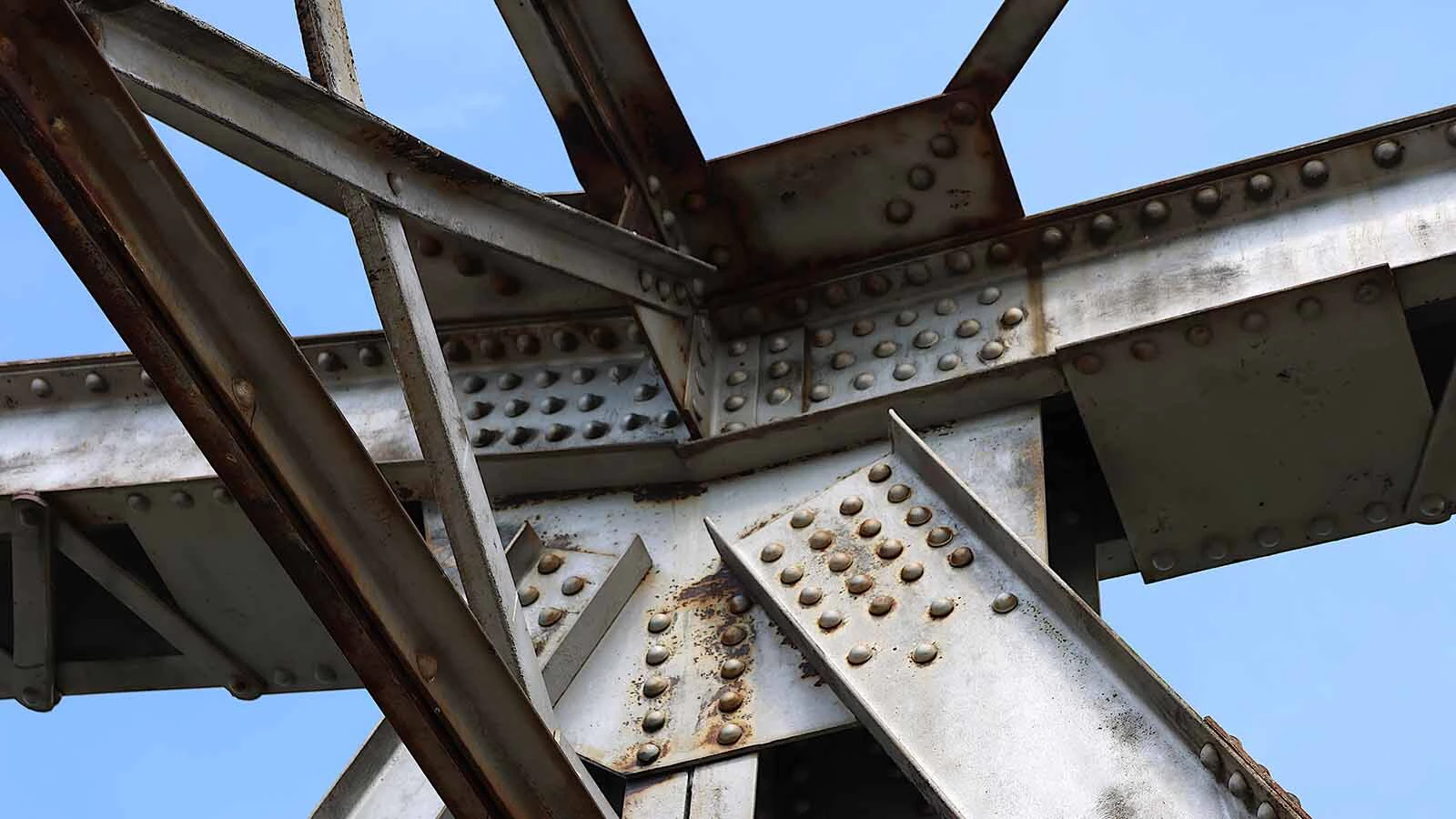 Beams and bolts at the top of the bridge brought it all together in 1924.