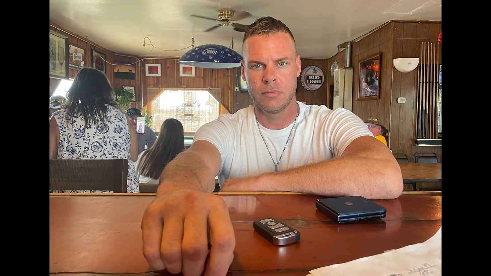 Having moved to Medicine Bow, Wyoming, only a month before, Shawn Valvardy makes friends at Old West Bar.