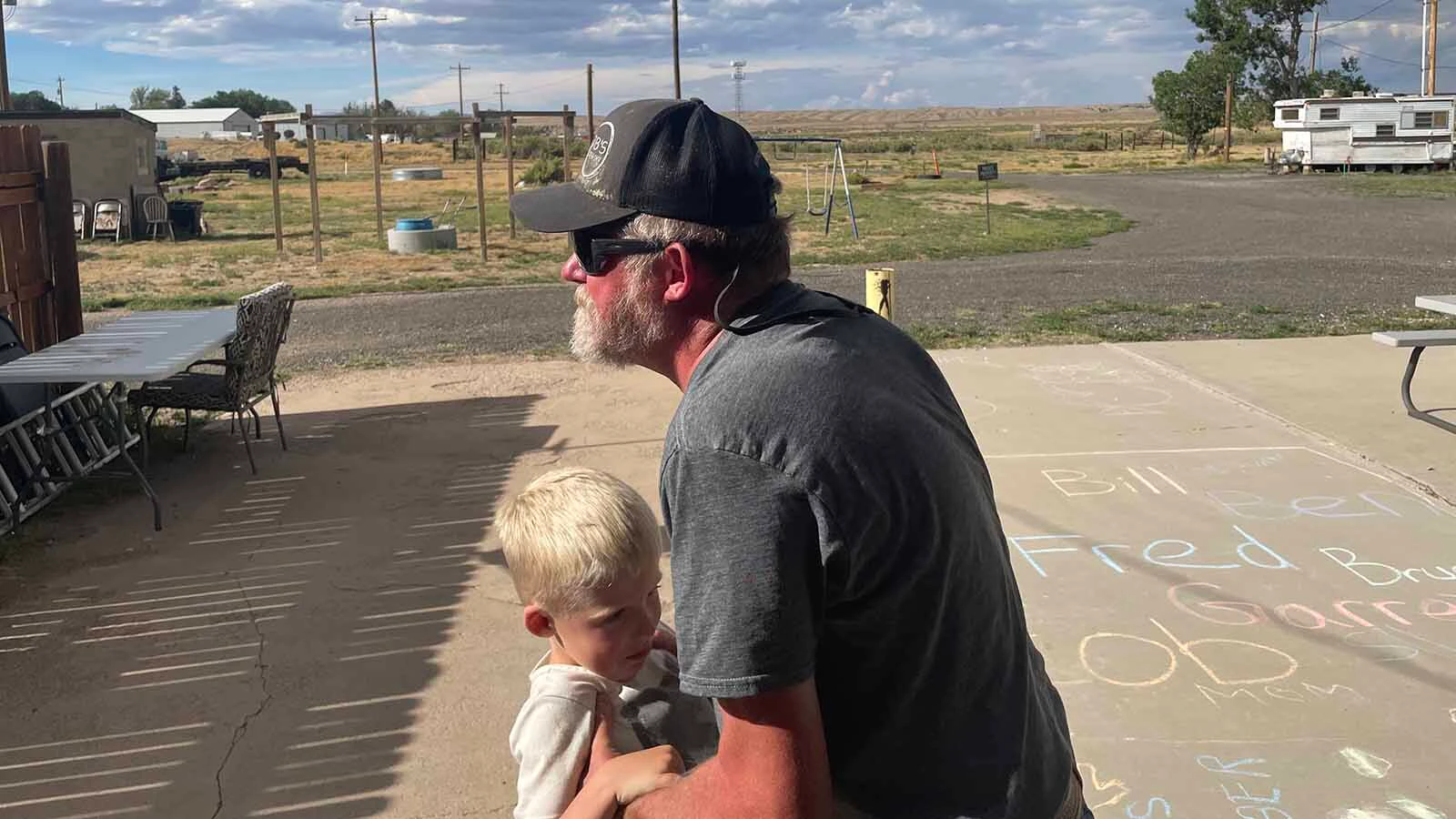 Medicine Bow Mayor Justin George with his son, Silas, both generational residents of the small Wyoming town.