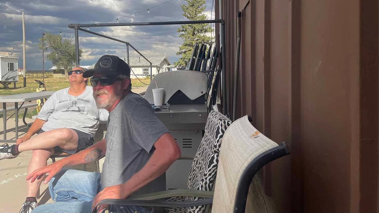 Old West Bar owner Kristi Wickizer, left, gabs with Medicine Bow owner Justin George on a recent Saturday evening.