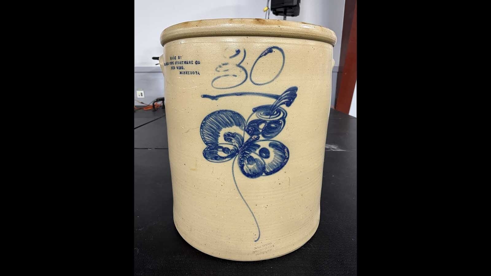 This rare antique crock comes with butterfly art and deep roots in Red Wing, Minnesota, southeast of Minneapolis on the Mississippi River. It sold for $32,000 on Jan. 10, just in time for its owner’s 91st birthday, auctioneer Ken Bramer told Cowboy State Daily. Lois Jurgens said when she heard the selling price, it felt like she was in a dream.