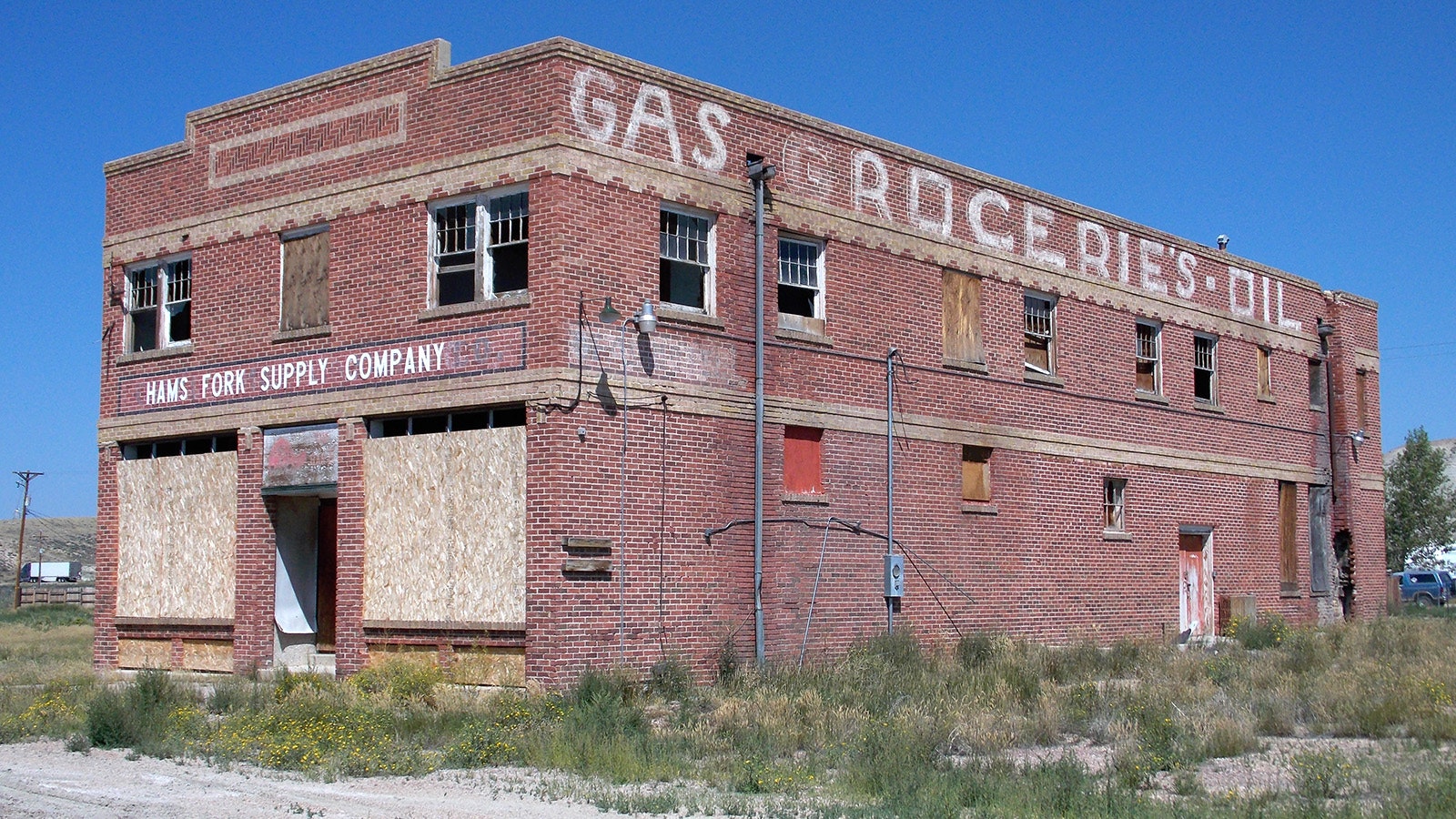 The historic brick Opal Mercantile building was vacant for 40 years and on the verge of being demolished when it was saved by a father and son who moved from California to restore the building and open an ammunition manufacturing business.