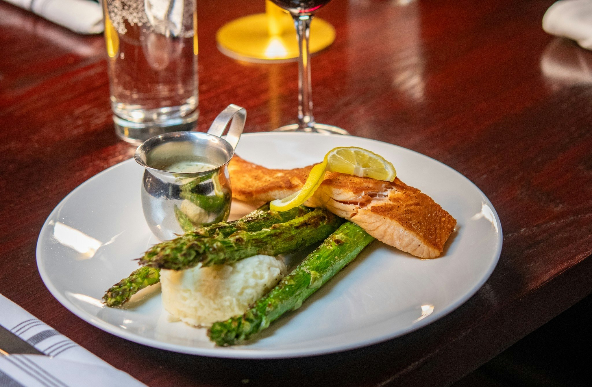 Seared Atlantic slmon with dill chablis cream sauce.