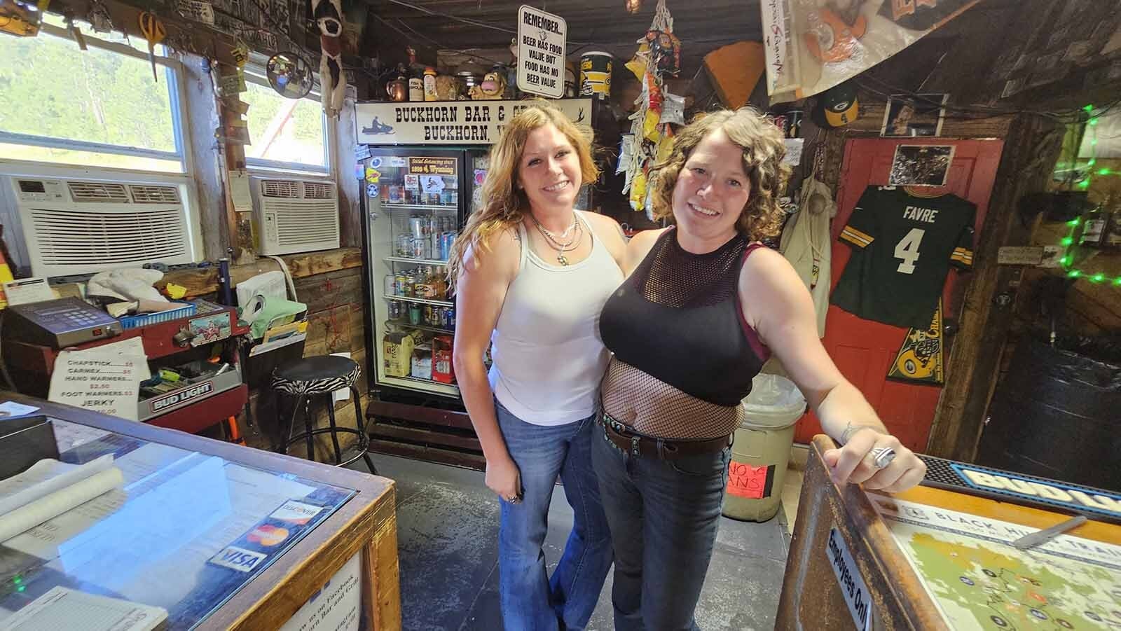 Two barte4ders pose for a photo at The Buckhorn Bar near South Dakota's border in Buckhorn, Wyoming during the Sturgis rally week.