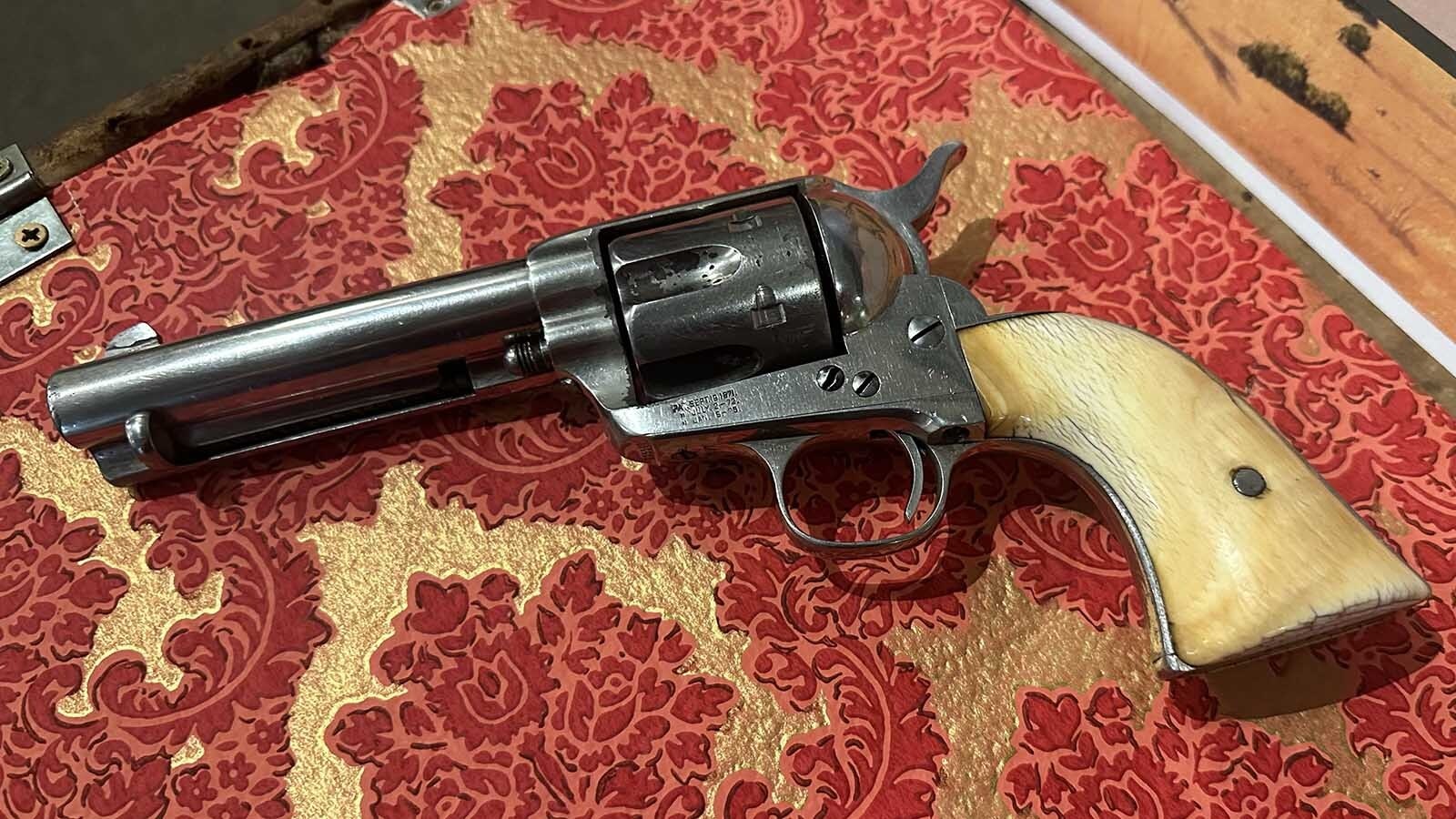 It is believed that this is the gun that Deputy Sheriff Sam Swanner lifted off the body of outlaw George Spencer. The known facts are that Swanner was present at the gun battle where Spencer was killed, the gun was made prior to 1892, there is a firsthand account of an ivory handled six-shooter being picked up by a deputy sheriff and the gun belongs to the family of Swanner.