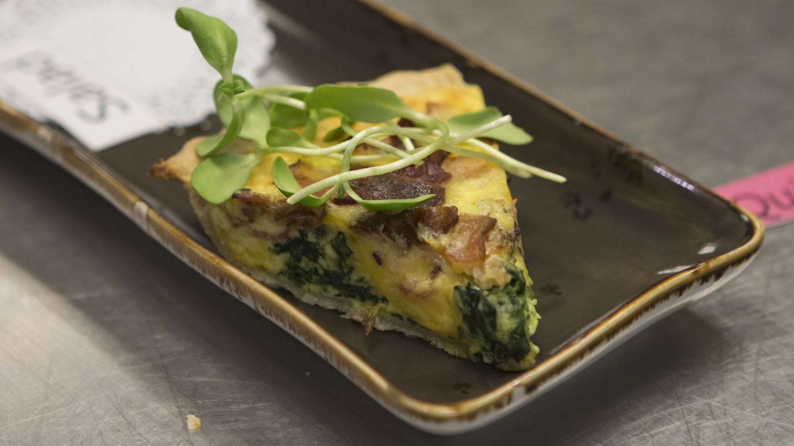A variety of quiche is offered on the specials menu.