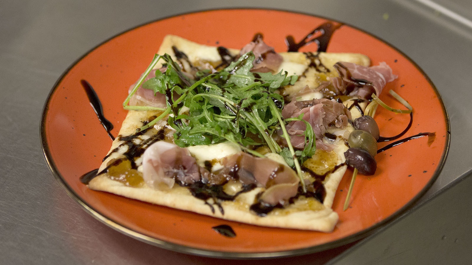 The flatbread with fig and prosciutto is one of Parders many delicious specials.