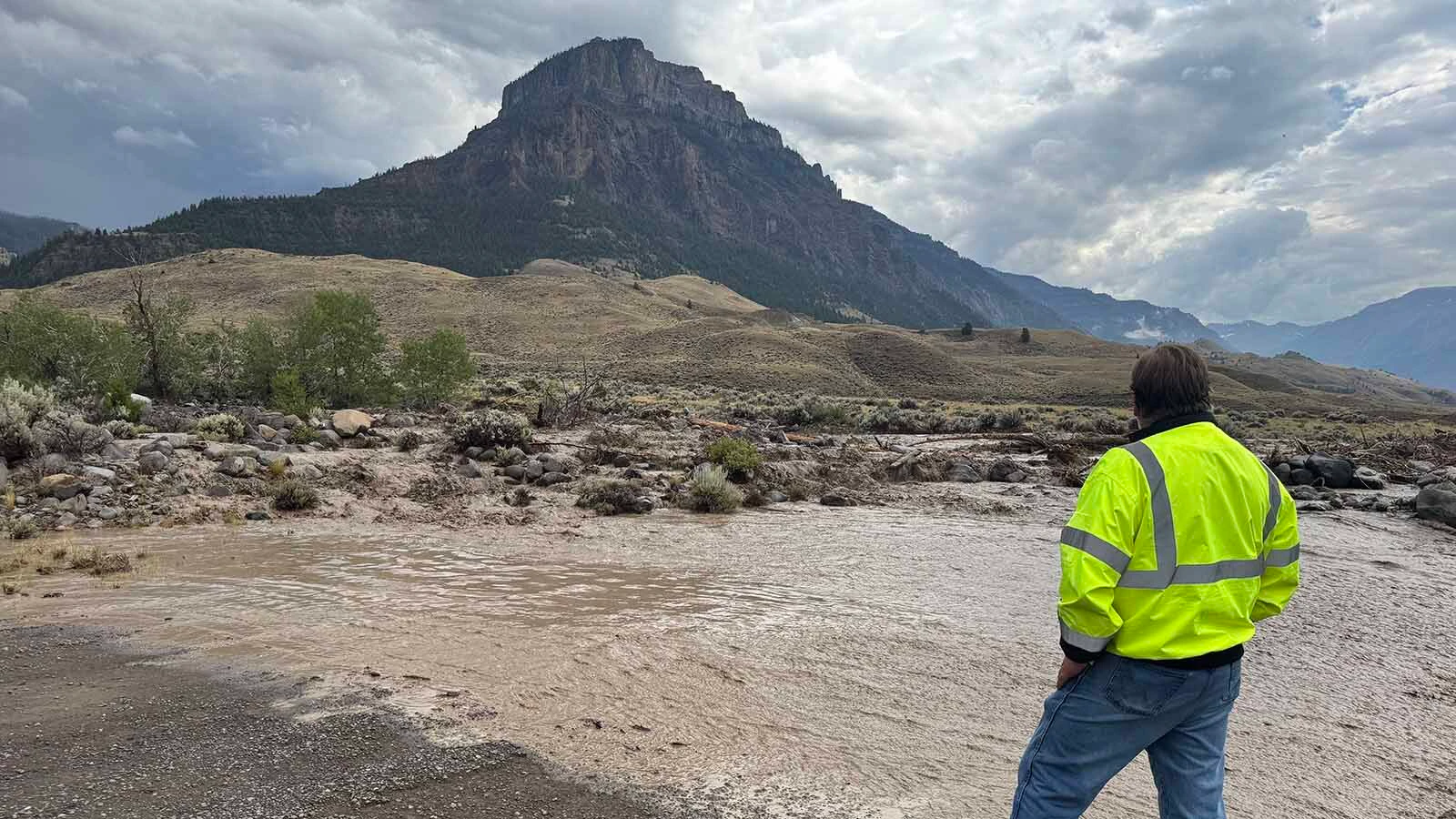 Park County officials say a Wednesday flash flood nearly destroyed a bridge over the Shoshone River and cut off access for some county residents. “We watched a wall of debris build up and surging muddy water begin to overflow the banks,” said a witness.