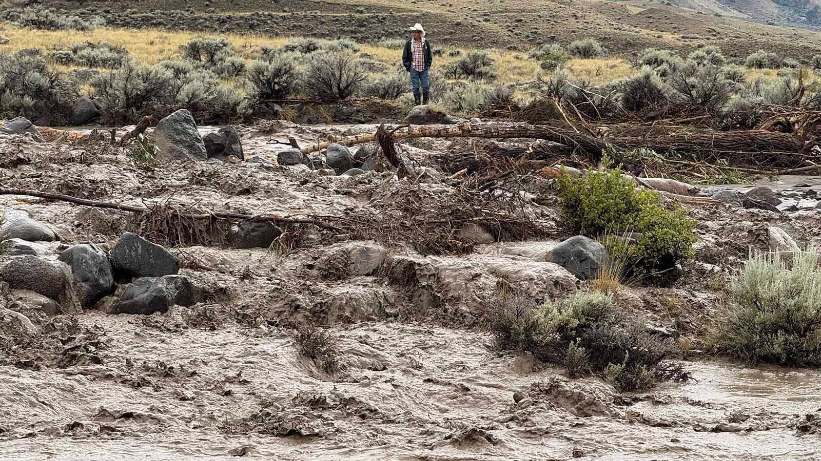Park County officials say a Wednesday flash flood nearly destroyed a bridge over the Shoshone River and cut off access for some county residents. “We watched a wall of debris build up and surging muddy water begin to overflow the banks,” said a witness.