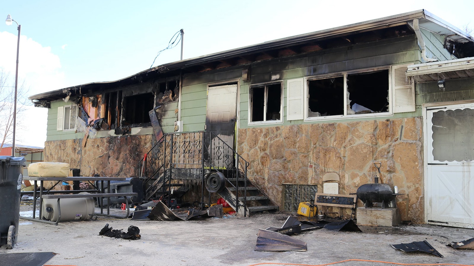 Ryan Pasborg ran into this burning house to save a Green River woman and her son.