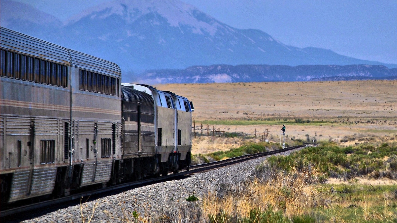 An Amtrak passenger train runs through Colorado's souther Front Range. An effort to connect the Front Range and Cheyenne with passenger rail is gaining momentum.