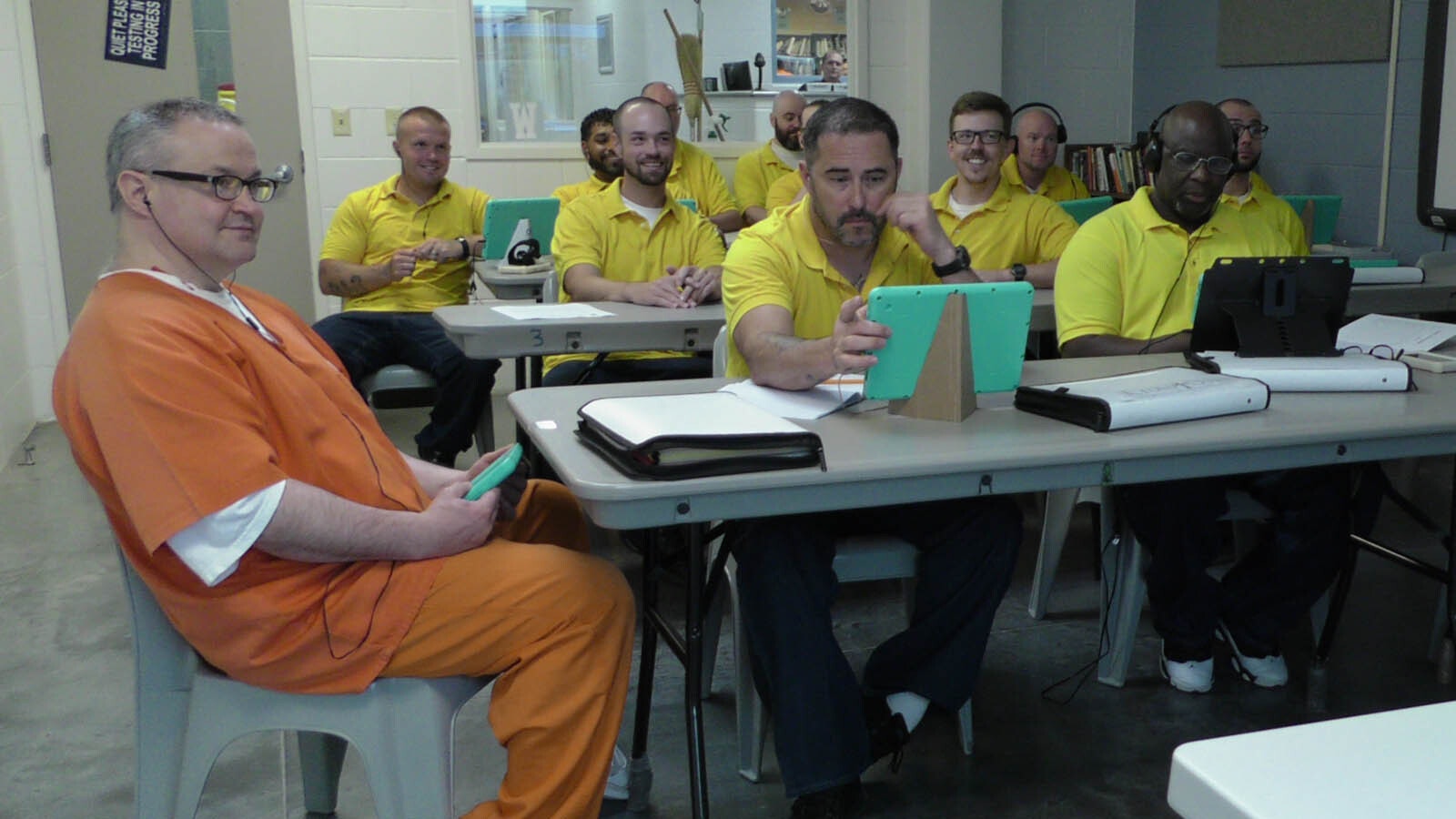 Martin Gabriel, right front, is one of 20 male inmates who were selected to be in the first cohort of the pilot program.