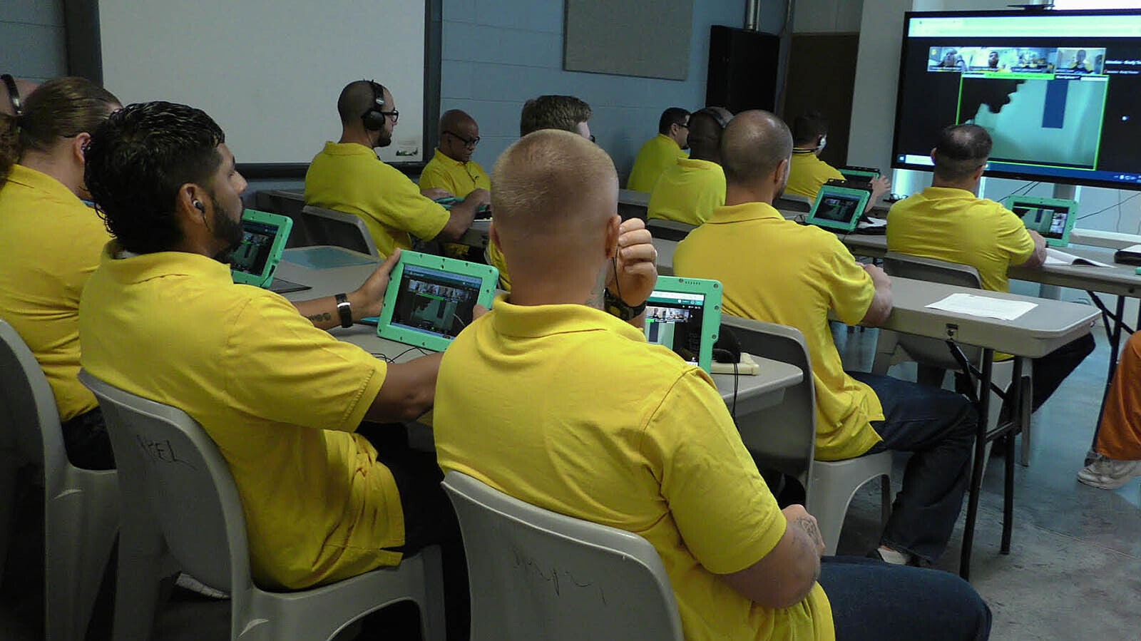 Inmates use tablets for their coursework with their lectures being a hybrid mix of online and in-person learning.