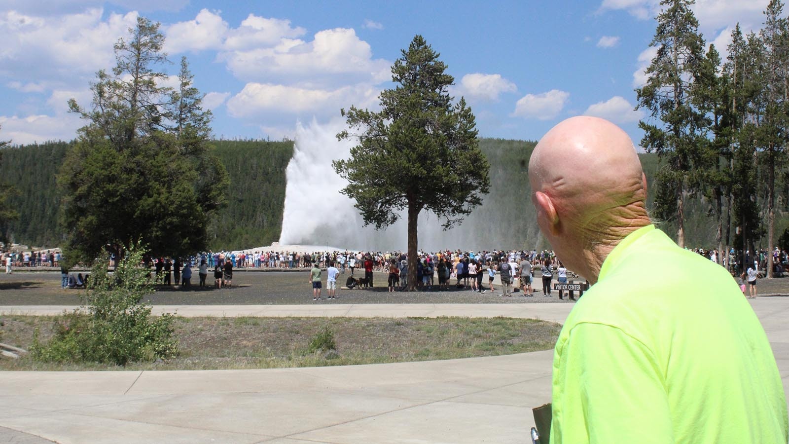 Paul Terry takes in the Old Faithful Geyser from a more comfortable distance away from the crowds.