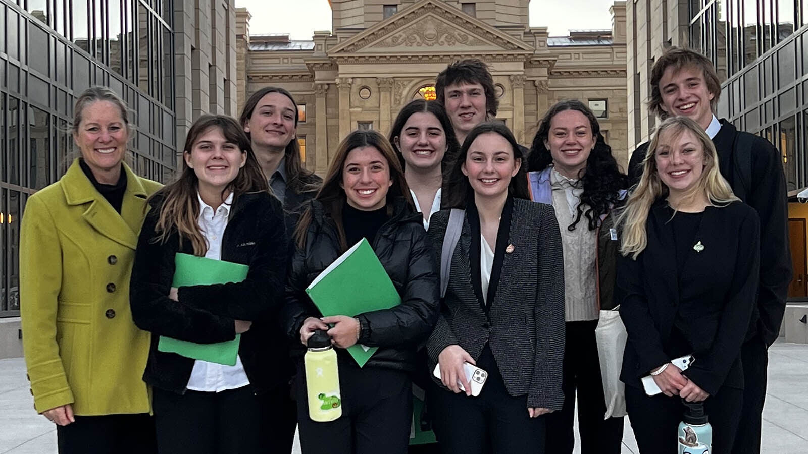 Paula Volker, left, with students from her advance placement class in Cheyenne as part of the “We the People” competition.