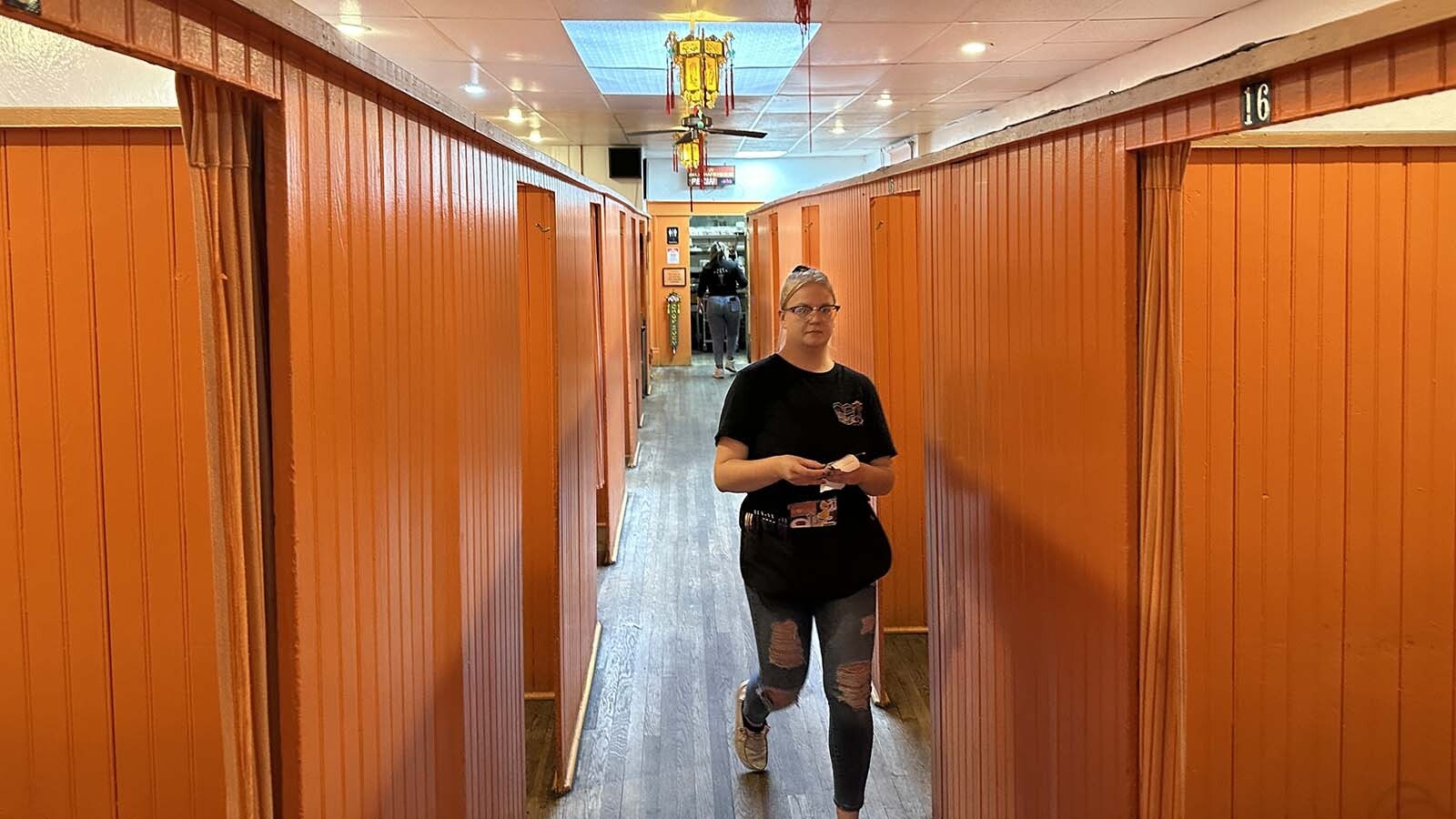 Pekin Noodle Palace server Madison Fletcher said owner Jerry Tam has started talking about moving beyond the family business.