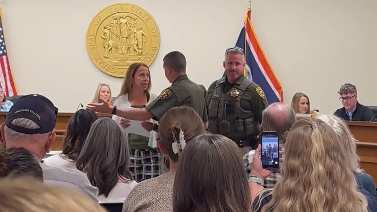 Law Enforcement Physically Removes Woman From…