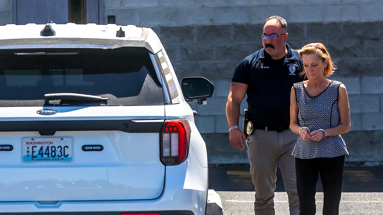 Phyllis Krogman is in handcuffs during her arrest outside the Asotin County courthouse in Washington State in July 2025.