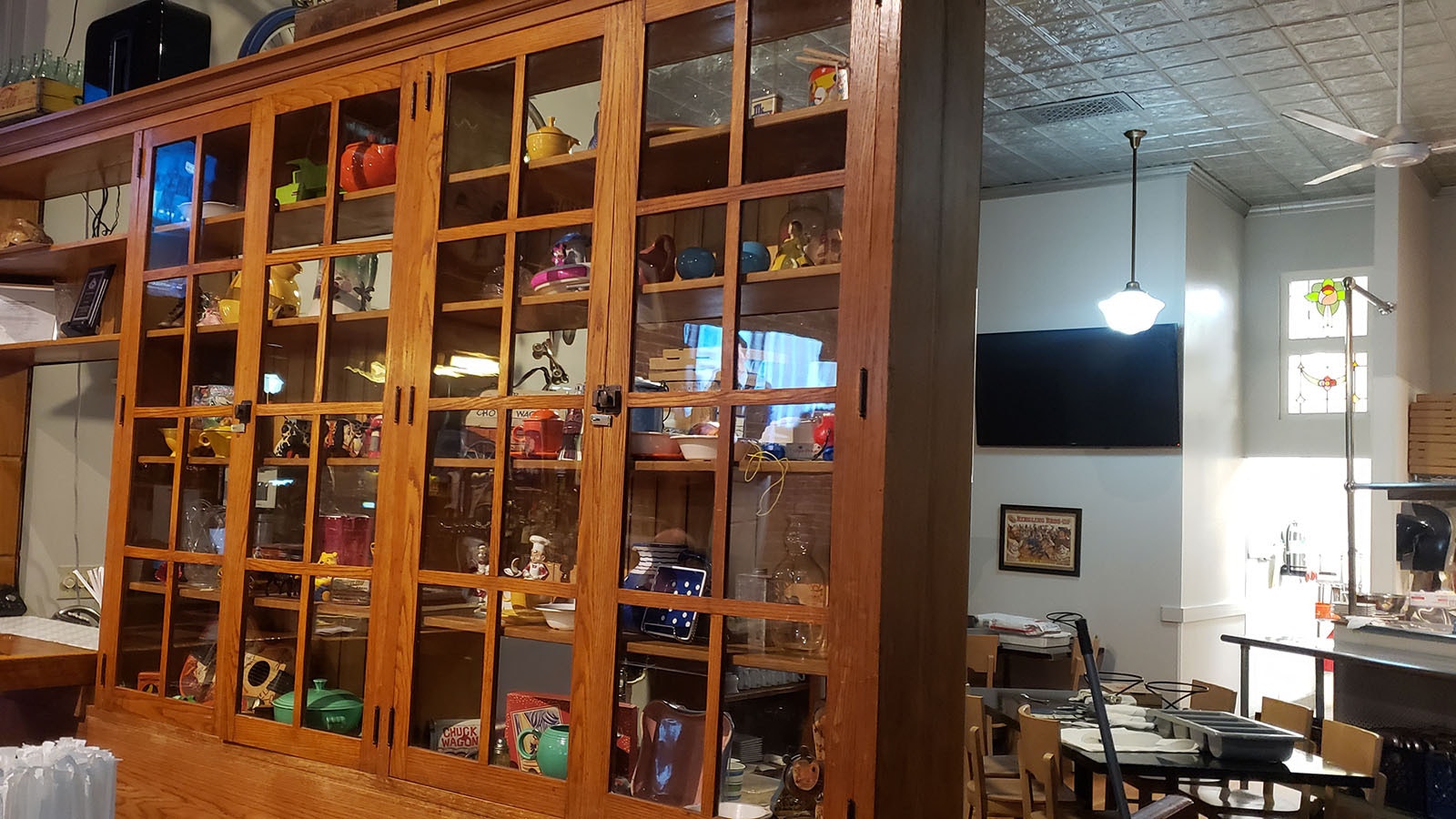 Pie Zanos co-owner Renée Tiller has placed many of her dad's antiques on display at the restaurant.