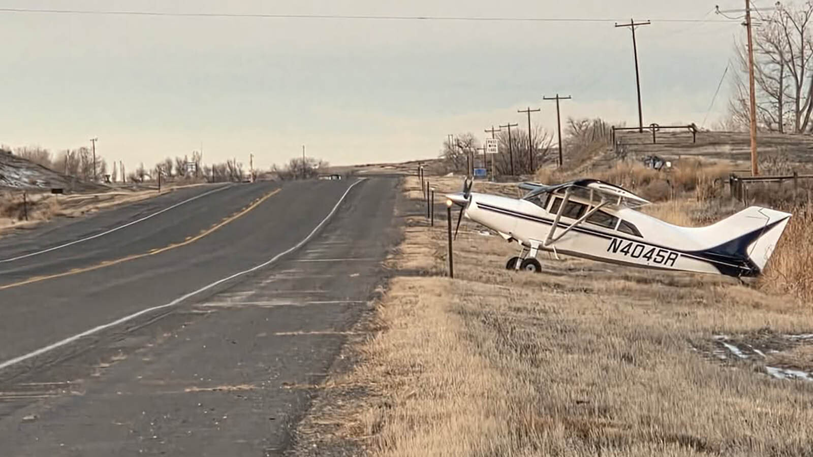 A Wyoming pilot flying to a visit with a doctor ran out of fuel and made a safe emergency landing on U.S. Highway 14 near Greybull. He made his appiontment, then after refueling, authorities blocked traffic so he could take off and return home.